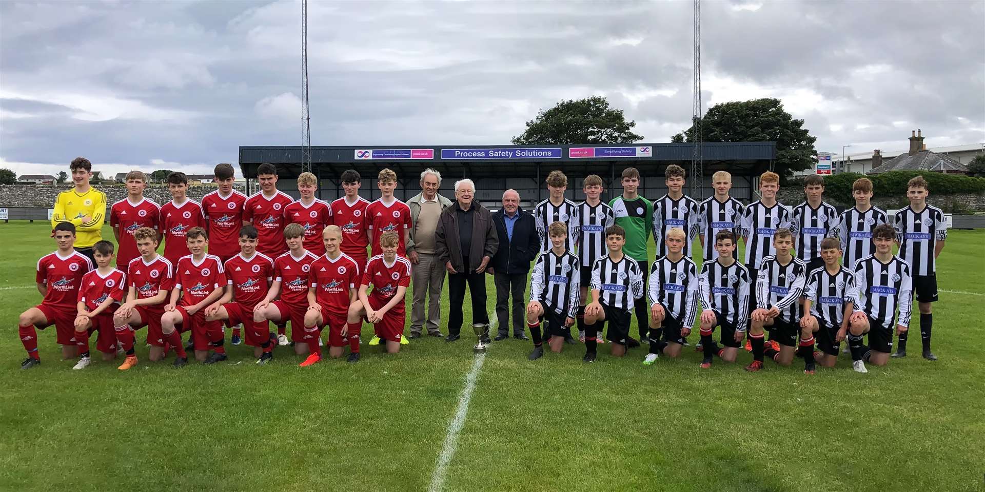 Caithness United under-16s and their Orkney Youth Development Group opponents line up at Harmsworth Park. Picture: Mel Roger