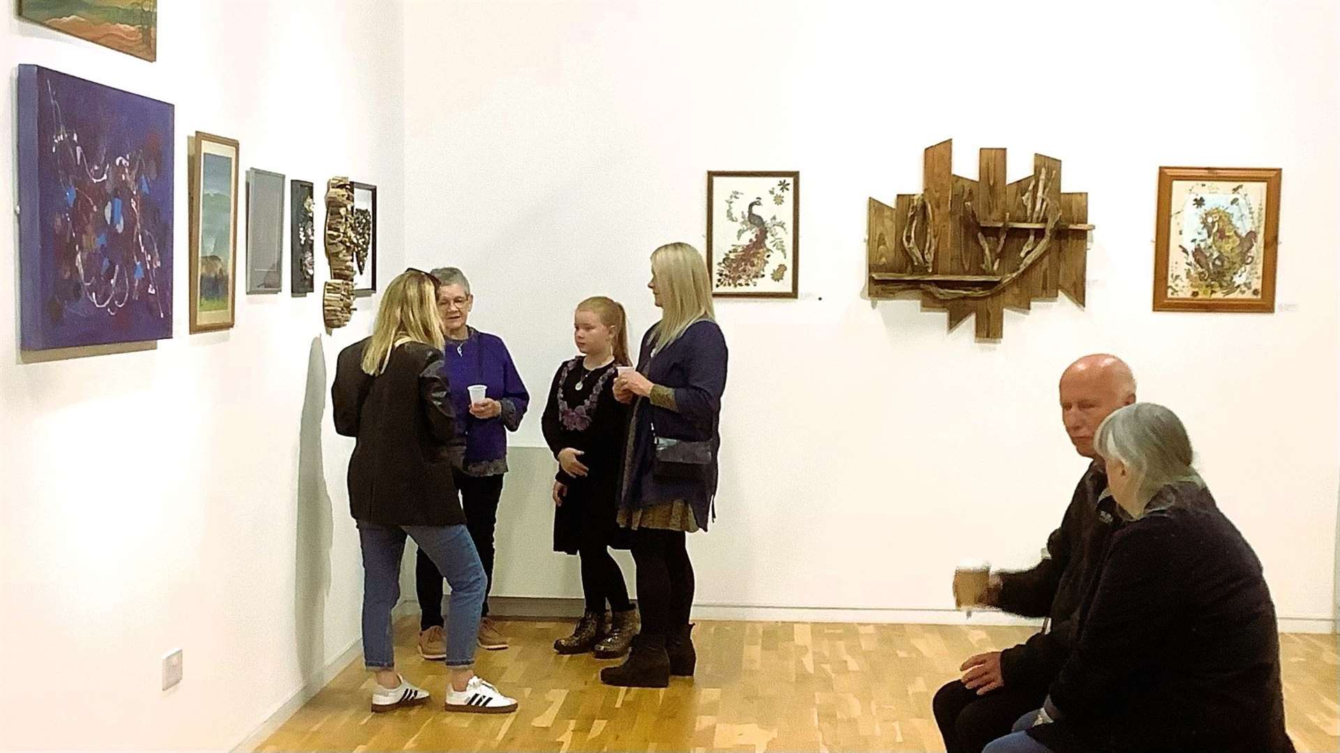 Visitors at the Thurso Art Gallery exhibition.
