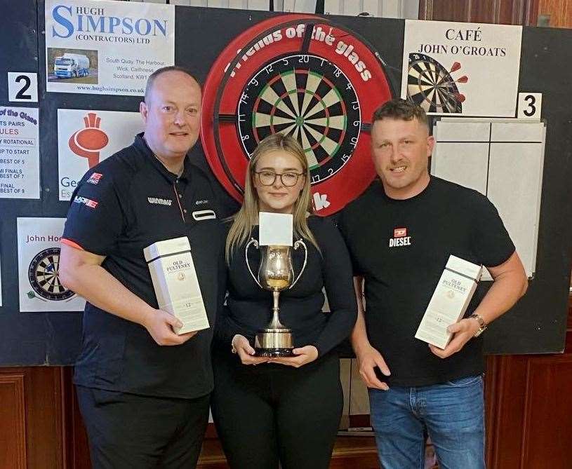 Men’s pairs winners Craig Quinn and Nicky Denoon with Abbie Thain, daughter of Claire Thain, one of the event organisers.