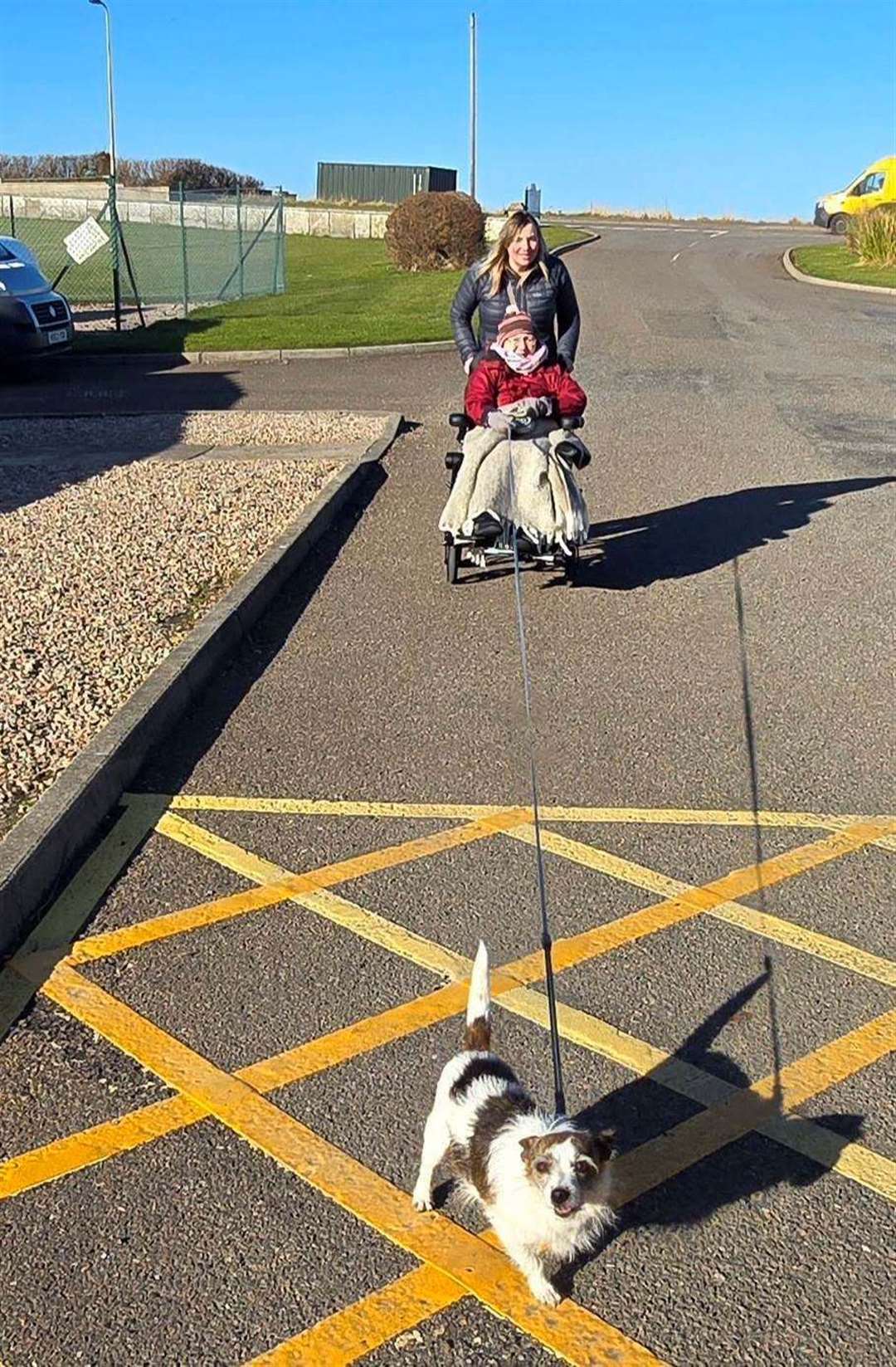 Isabella Kay enjoys a long dog walk with her daughter Tracey.