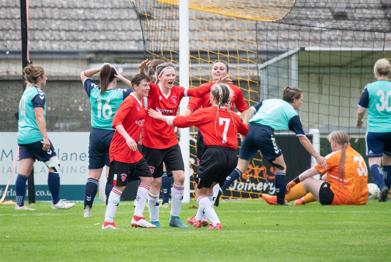 Caithness Ladies celebrate after going ahead through an own goal. Picture: Daniel Forsyth