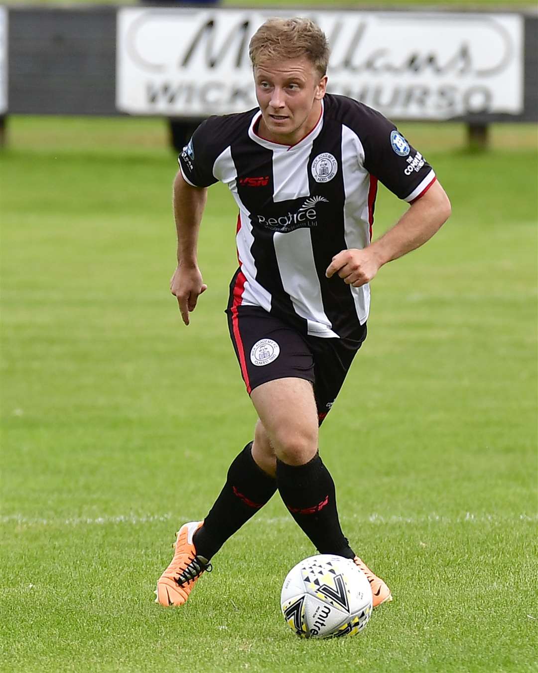 James Mackay in action against Turriff United earlier this month. The midfielder suffered a knee injury in that match and faces a long spell on the sidelines. Picture: Mel Roger