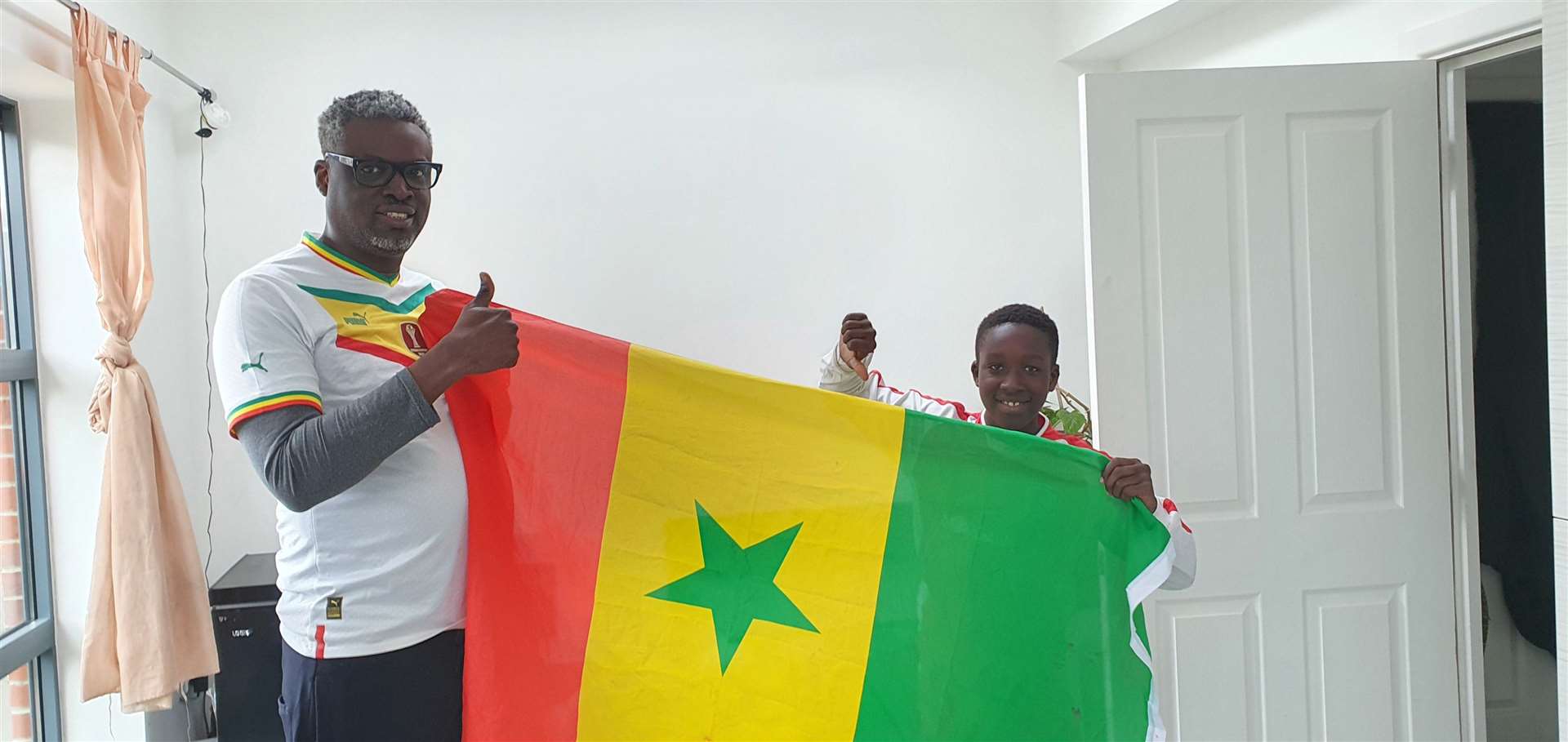 Aziz Ndiaye will support Senegal but his son, 11-year-old Jules, is backing England (Aziz Ndiaye/PA)