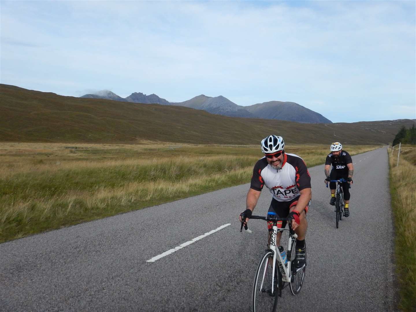 On the destitution road with An Teallach in the background.