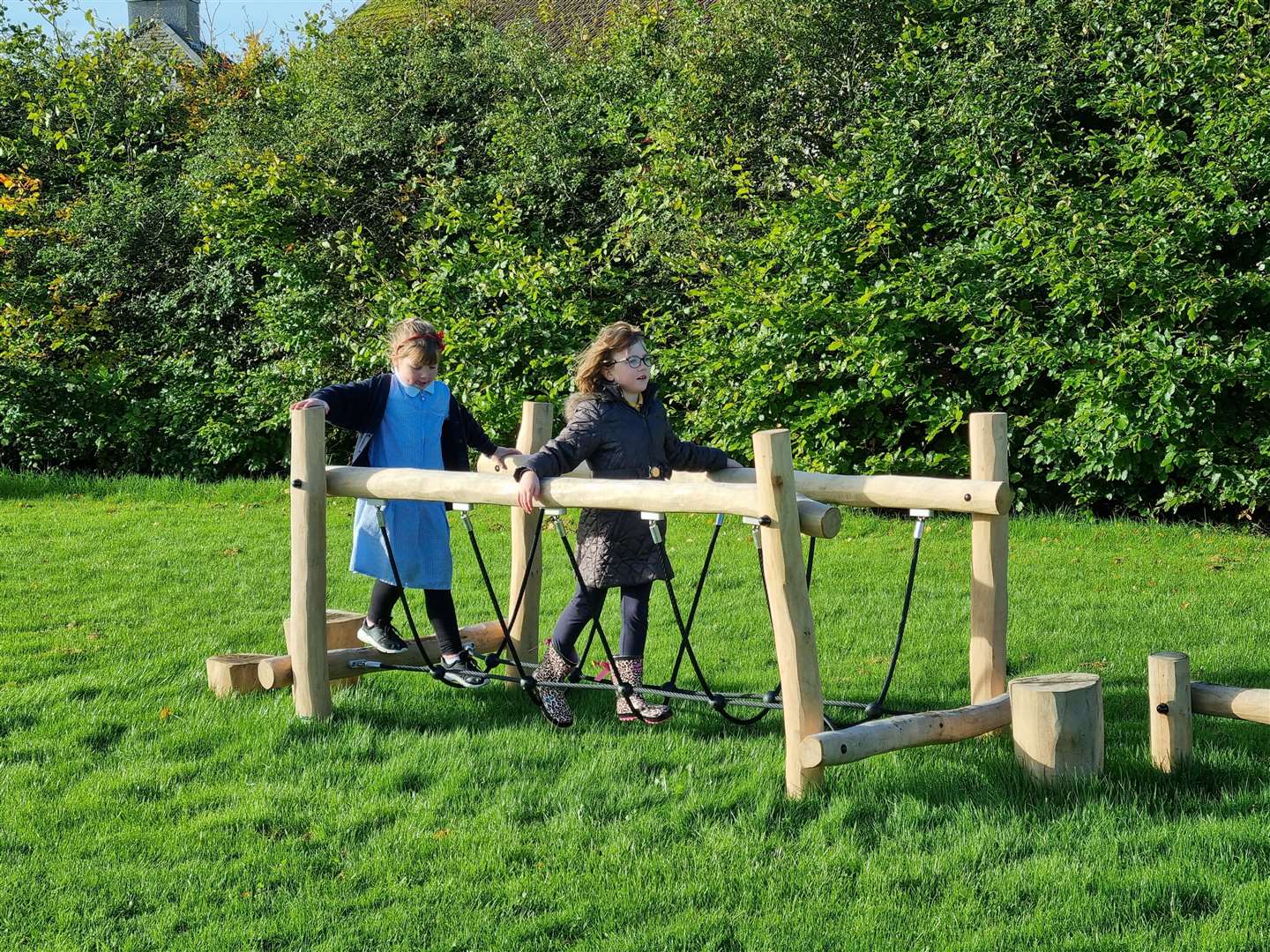 Pupils at Halkirk Primary School enjoy a turn on the new trim trail.