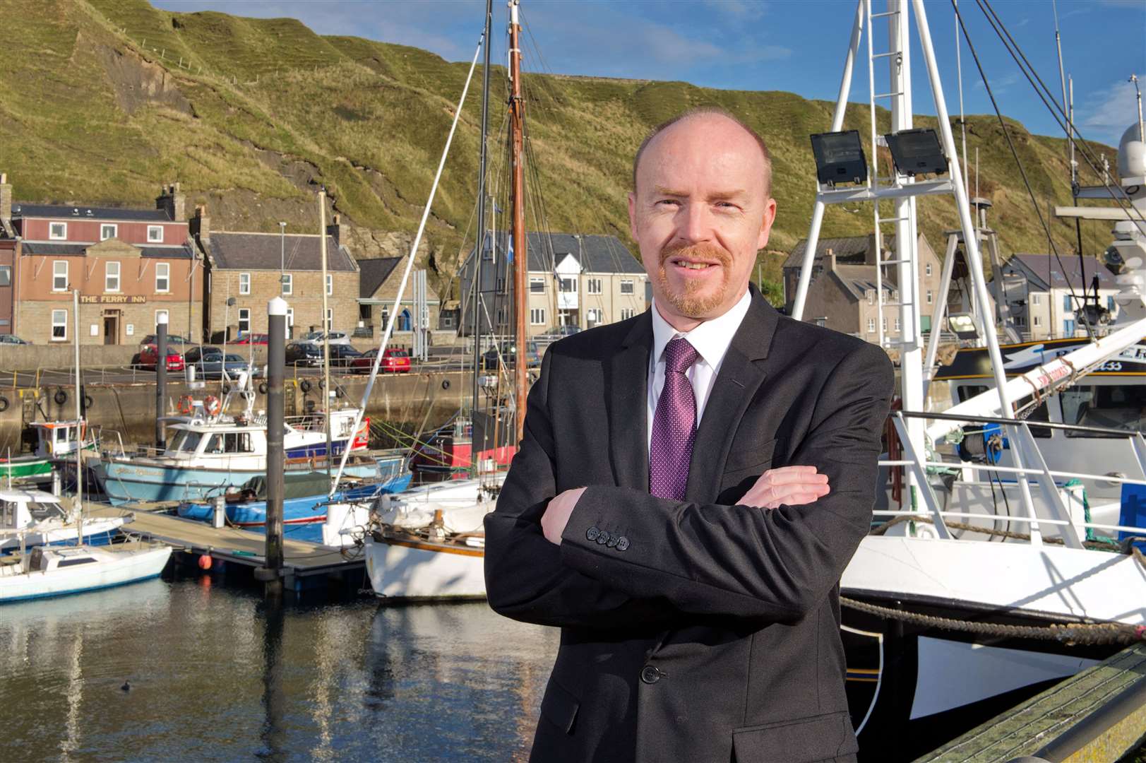 Eann Sinclair of HIE at Scrabster Harbour.