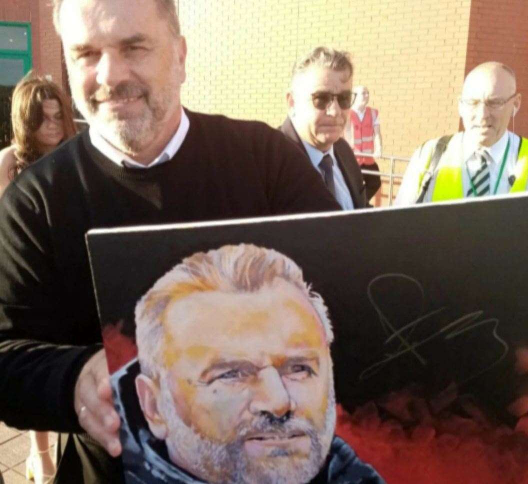 Celtic manager Ange Postecoglou signed the painting by Davie Greig from Thurso.
