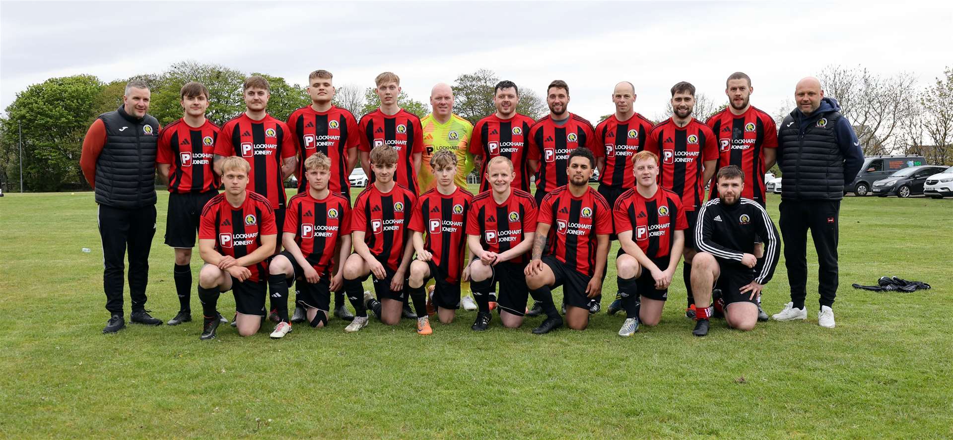 The Halkirk squad with co-managers Michael Bremner (left) and Paul Lockhart (right) before their Division Two match against Acks on Tuesday night. Picture: James Gunn