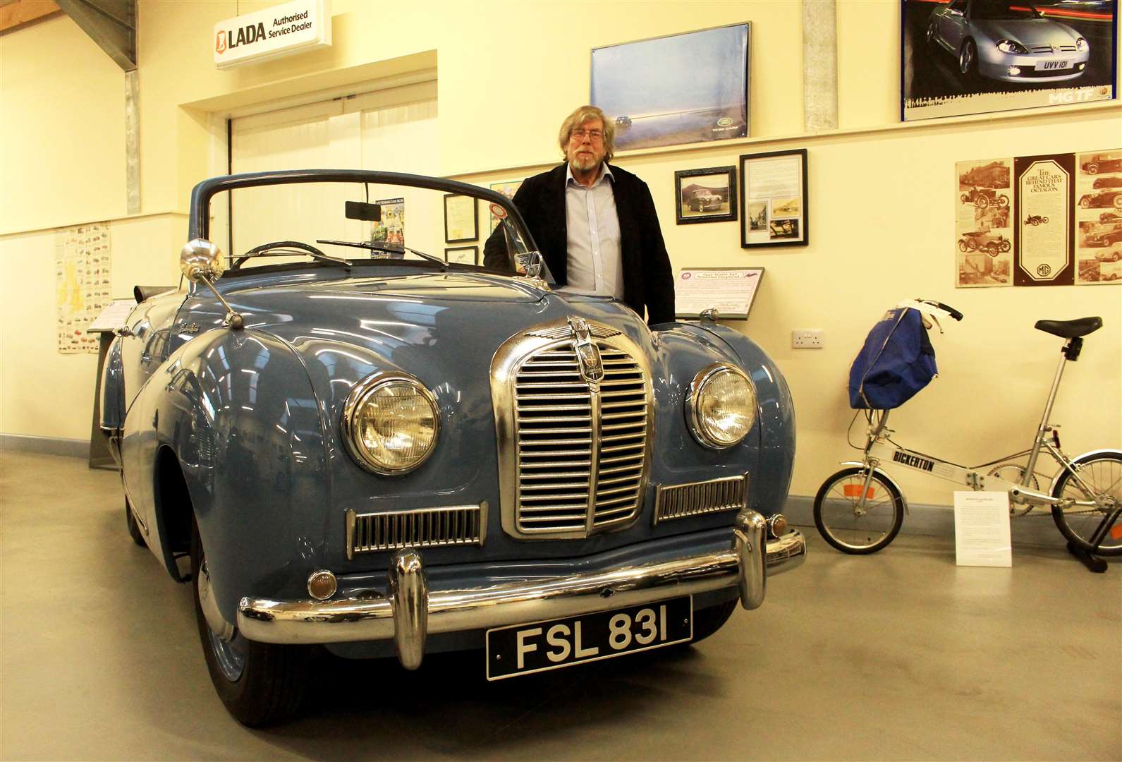 Chris Eyre beside a 1953 Austin A40 Somerset Drophead.