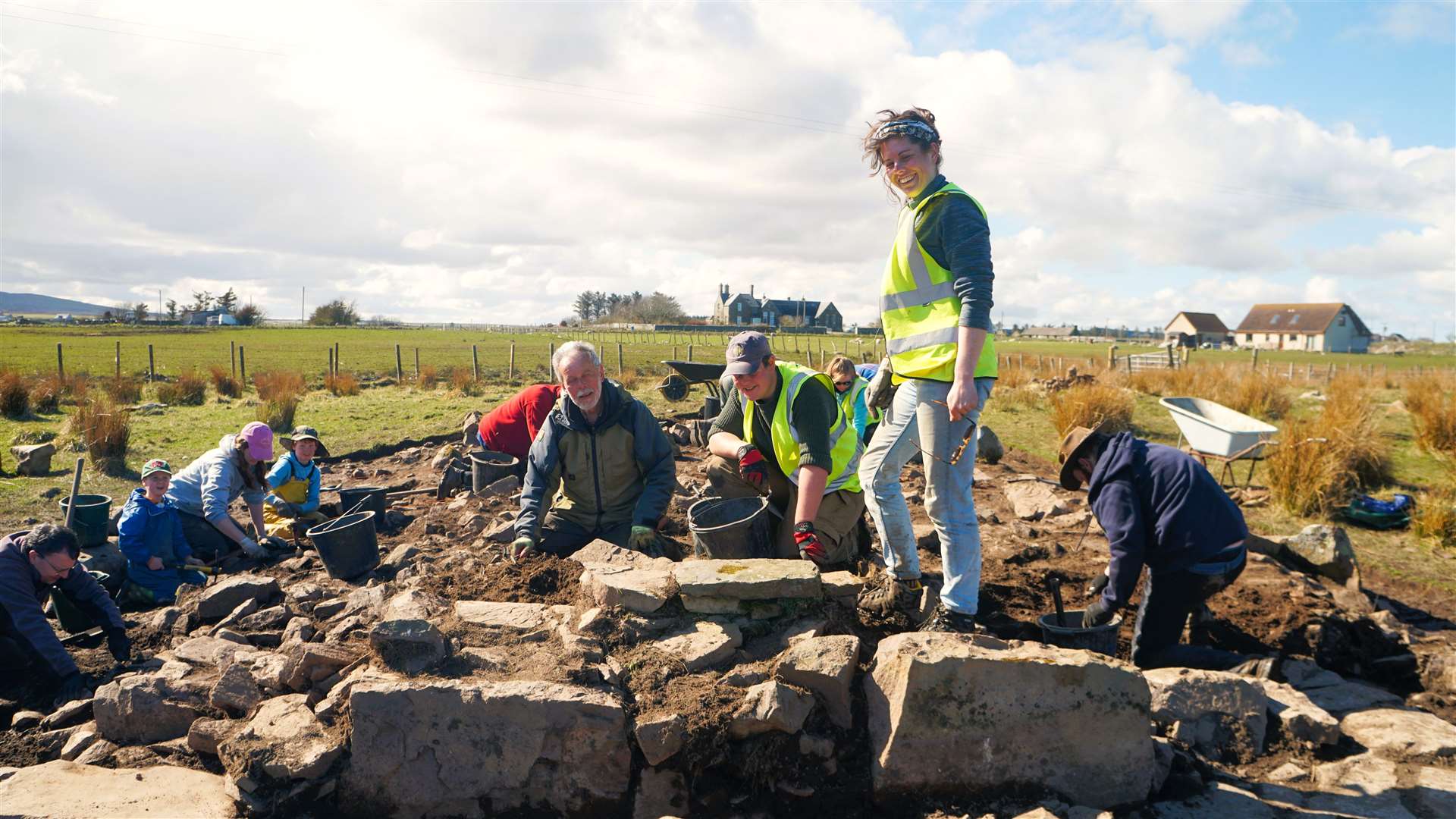 Katie from AOC Archaeology stands high on the structure uncovered. Picture: DGS
