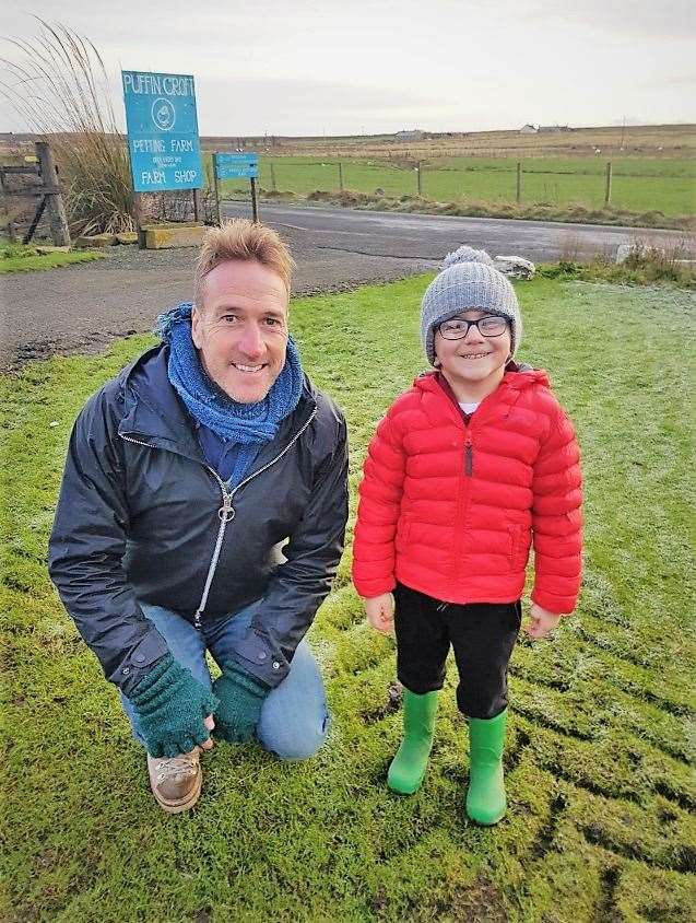 TV presenter Ben Fogle with a Puffin Croft fan, Jack, who lives locally and came to visit during the filming.