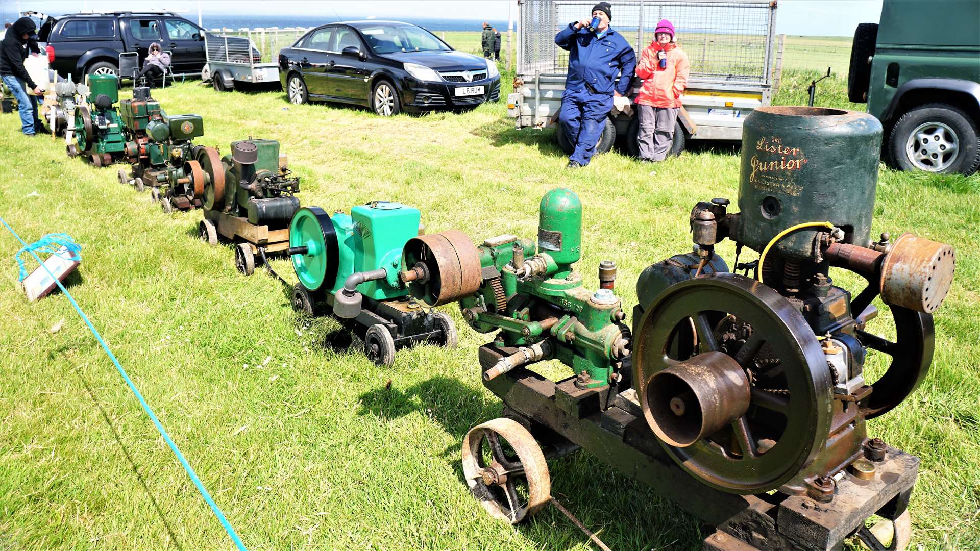 Stationary engines displayed at the entrance to the field.
