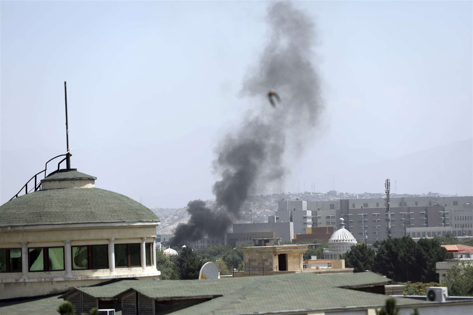 Smoke rises next to the US embassy in Kabul, Afghanistan, on August 15 2021 as officials burn sensitive documents (Rahmat Gul/AP)