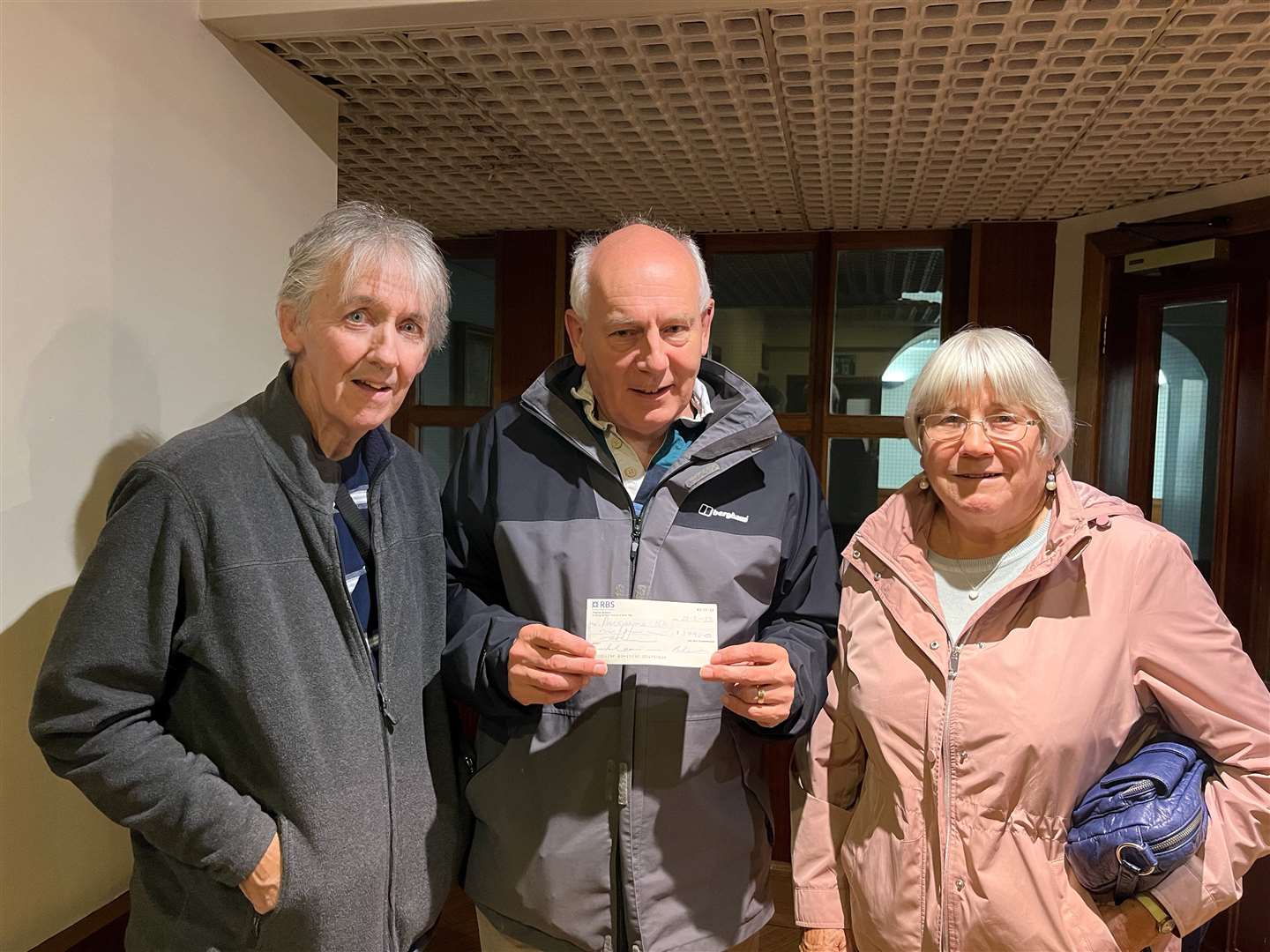 Neil Morrison (centre), chairman of Caithness Parkinson’s Support Group, with Andy Nicolson, who was treasurer until recently, and Sandy Mowat, a former chairperson of the group.