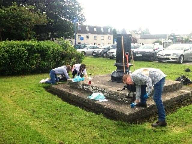 The volunteers from both Wick and Thurso clean around this old water feature.
