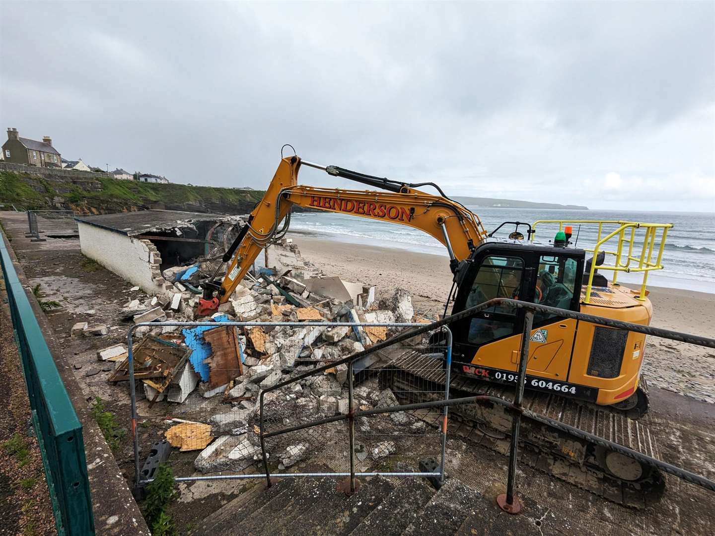 Demolition under way at the former canoe club building beside Thurso beach. Picture: Alison Reiss