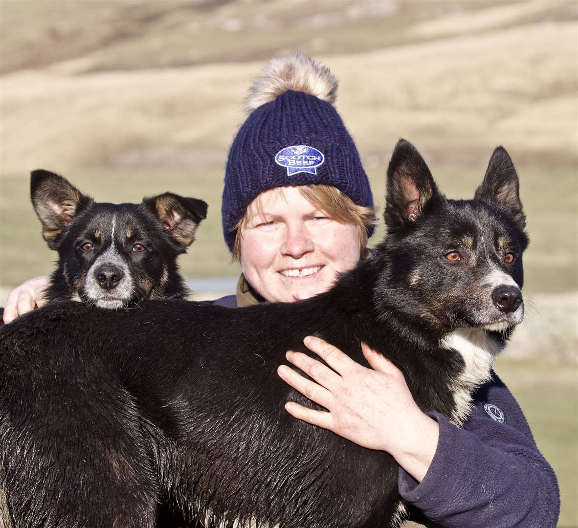 Joyce with a couple of her sheepdogs.