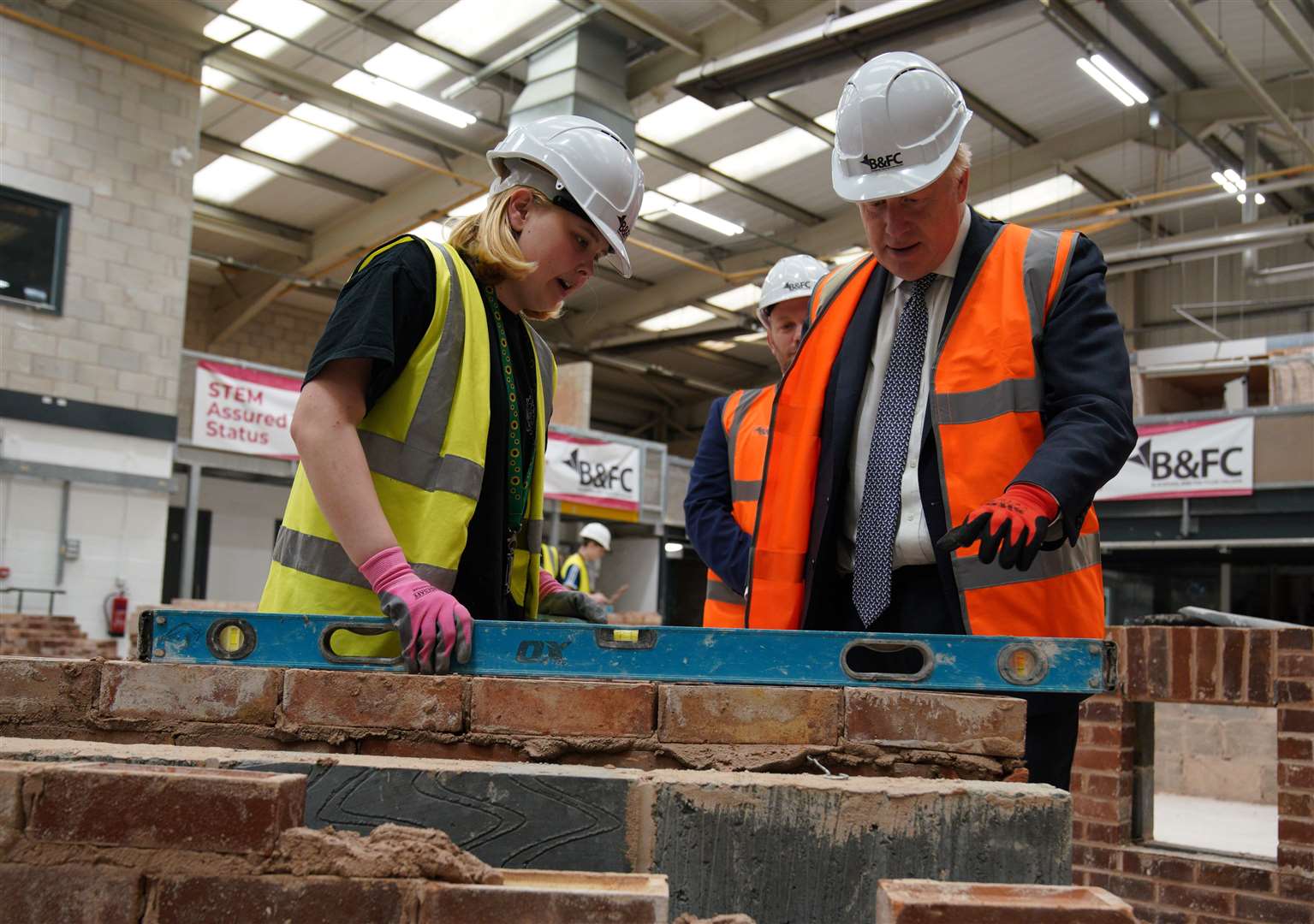 The Prime Minister used a spirit level to check his work (Peter Byrne/PA)