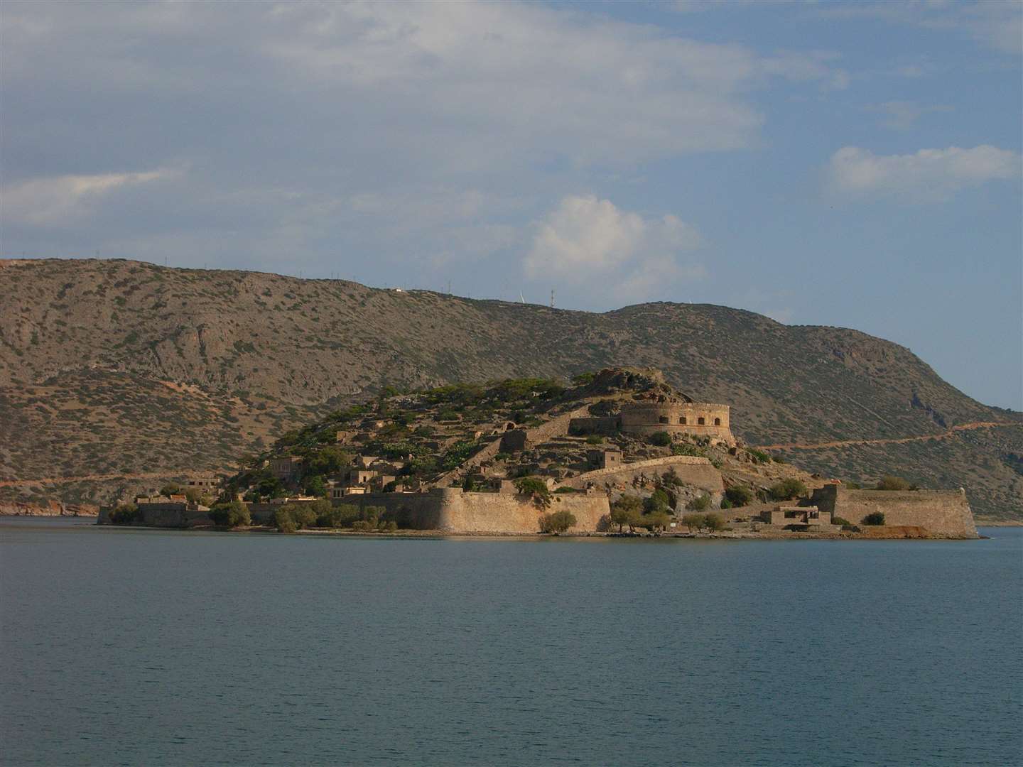The photo is of the tiny island called Spinalonga, once Greece's leper colony - a place of permanent lockdown.