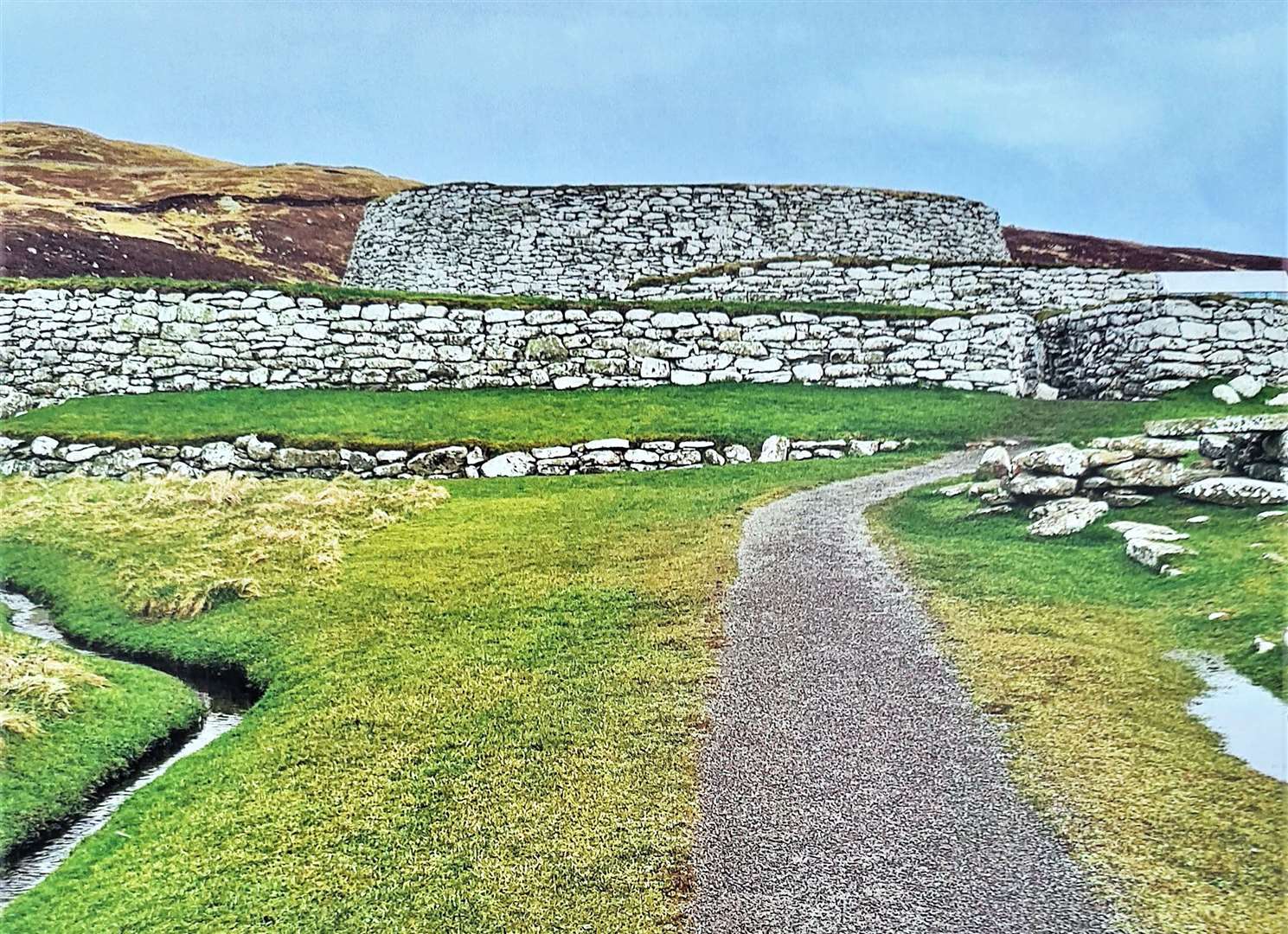 The month of April shows a photo by Helen Spencer, and is of Clickimin Broch which can be found on Shetland.