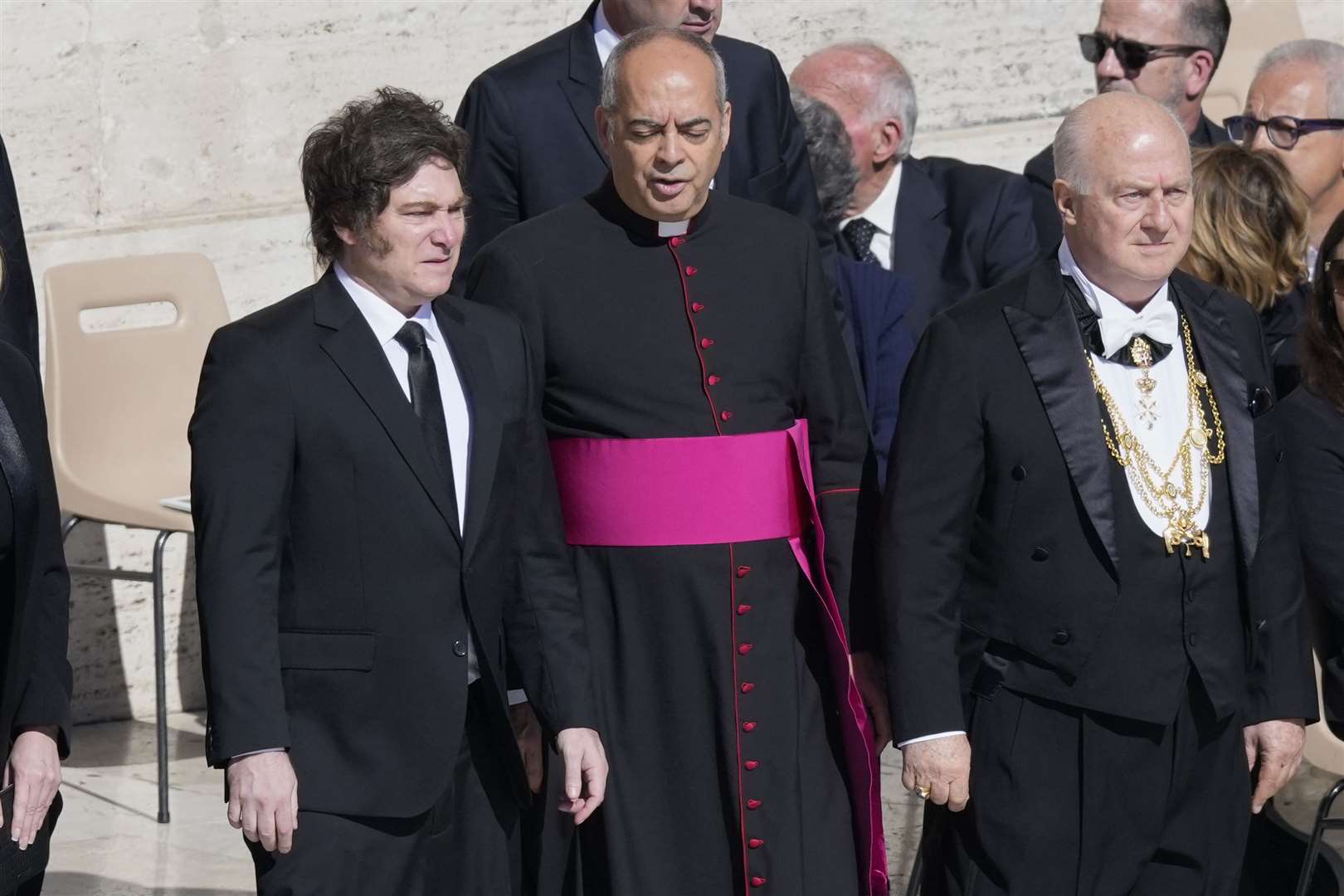 Argentina’s President Javier Milei, left, arrives for the funeral of Pope Francis (AP Photo/Gregorio Borgia)
