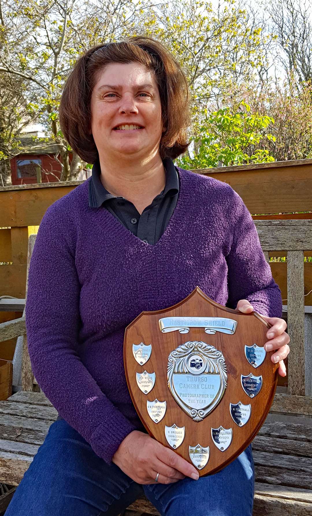 Club photographer of the year Jane Foster with her trophy.