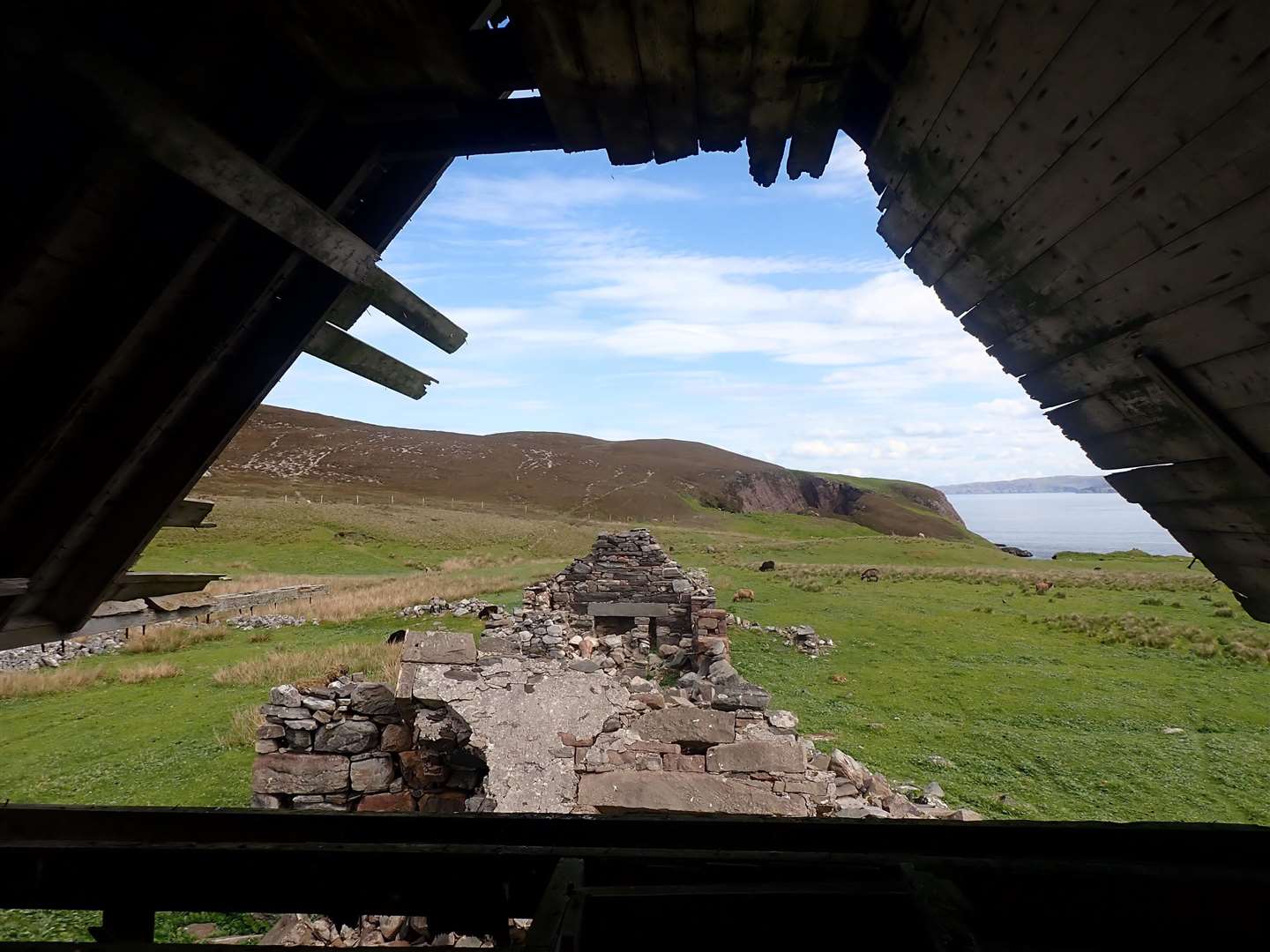 Looking out of one of the old houses.