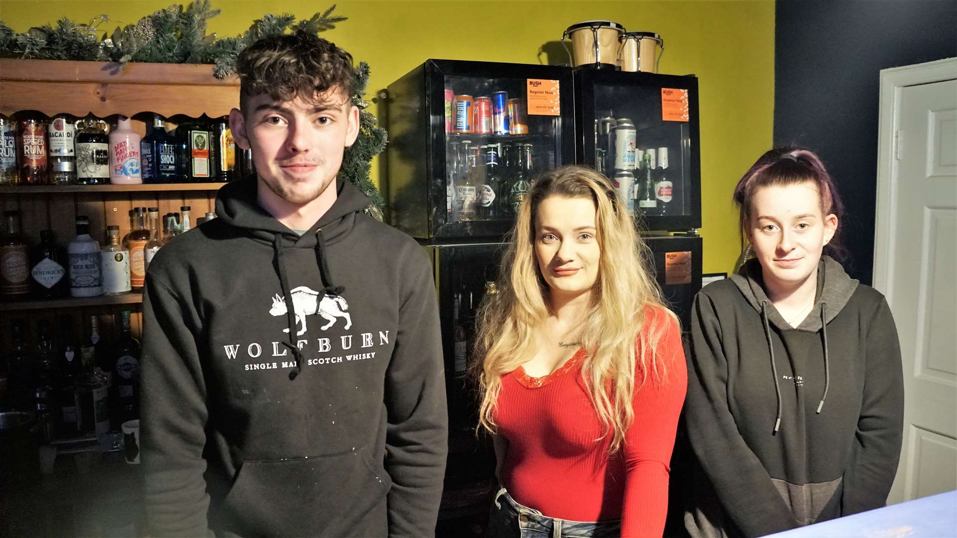 Teddy Hunt, centre, with bar staff at Valhalla on its opening night. The premises looked hastily put together inside and was hardly open before its doors finally closed. Picture: DGS