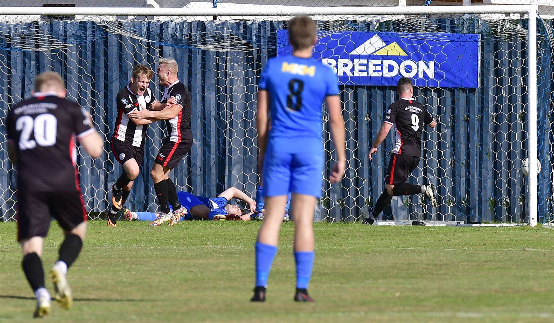 Mark Macadie and Jack Halliday celebrate after Macadie's 91st-minute winner for Wick Academy. Picture: Mel Roger