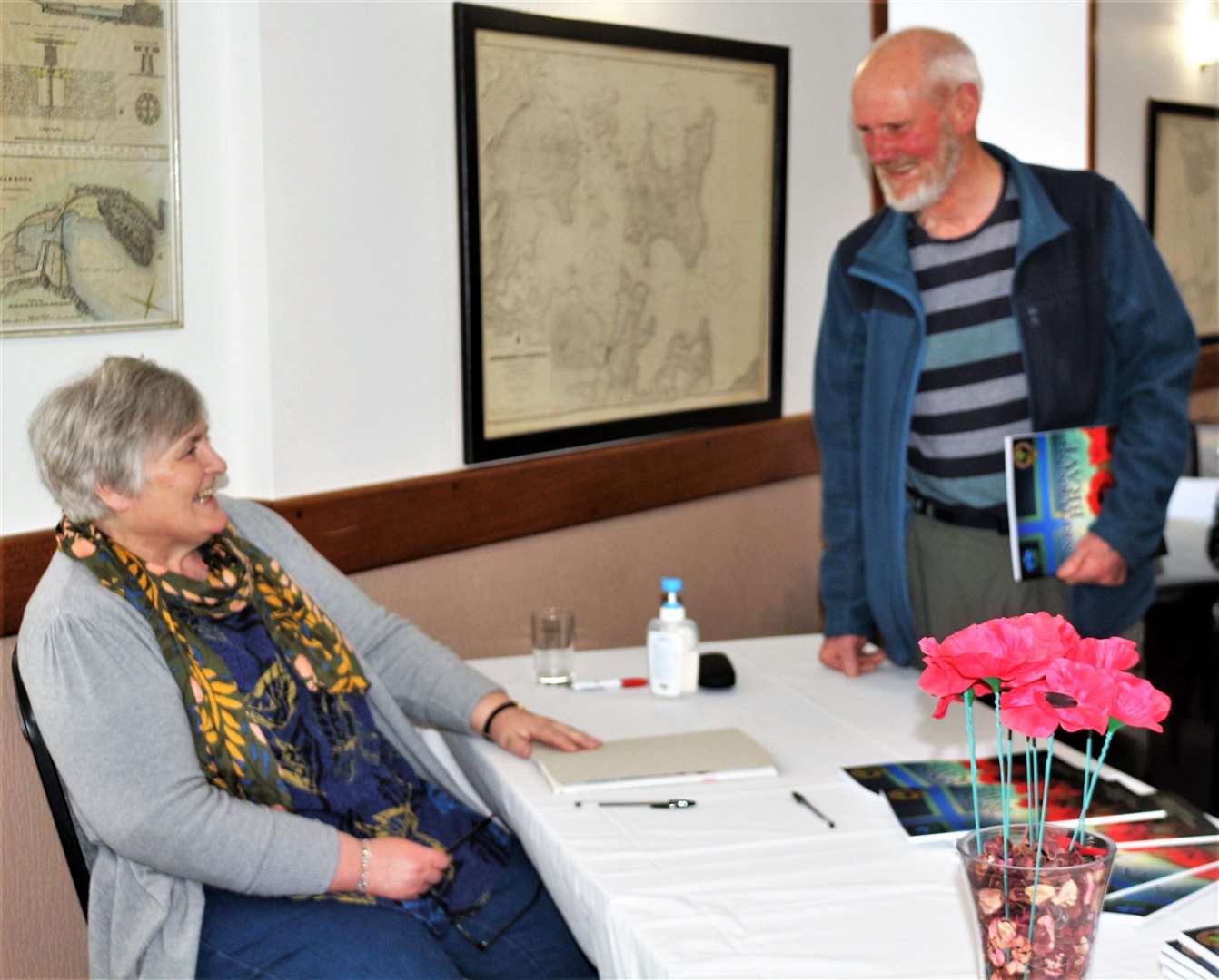 Kathy enjoyed having a natter with visitors to the event who purchased her book. Picture: Eswyl Fell