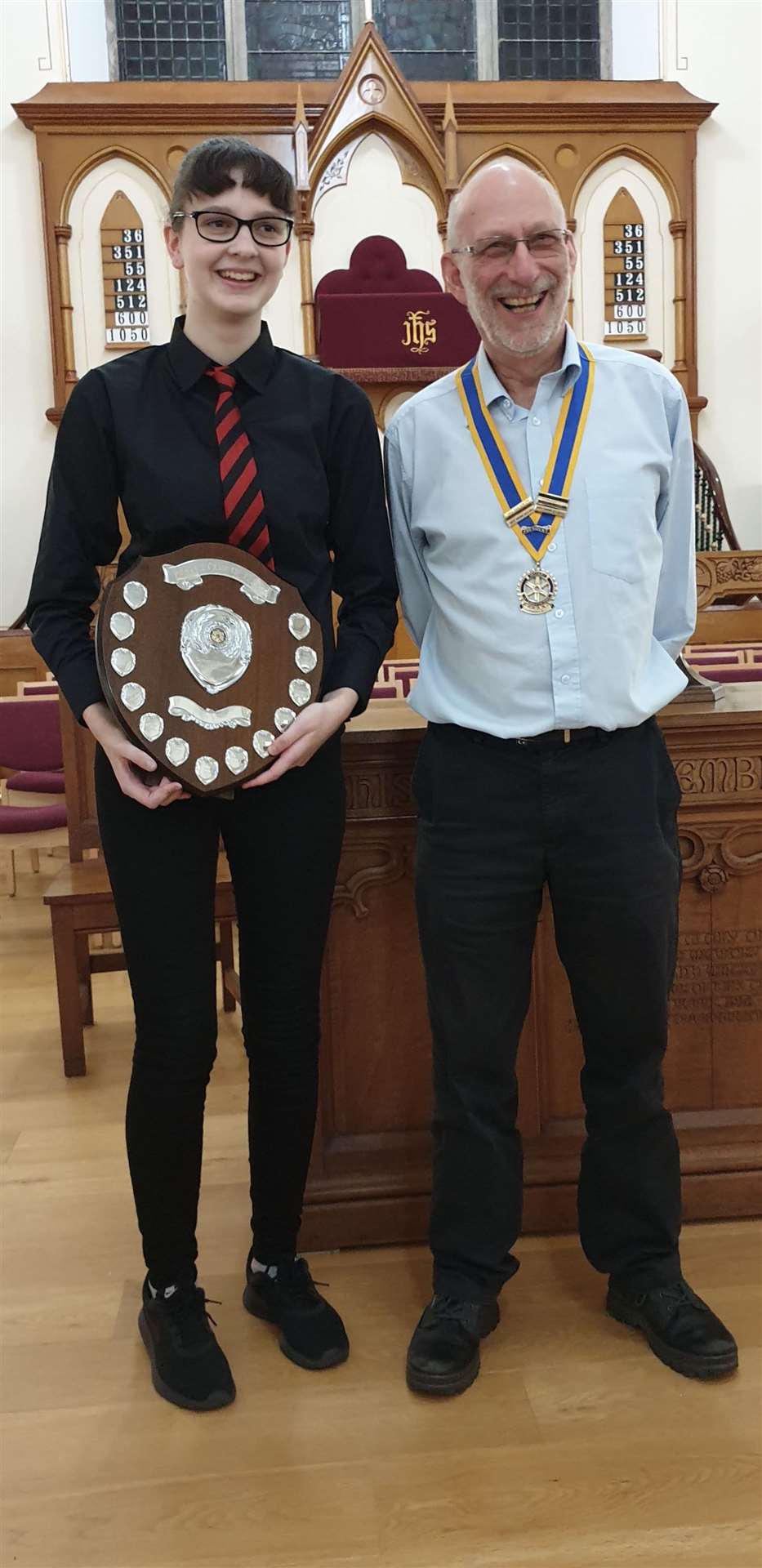 Winner Rhiannon Arrowsmith with Thurso Rotary president Alan Gerrard.