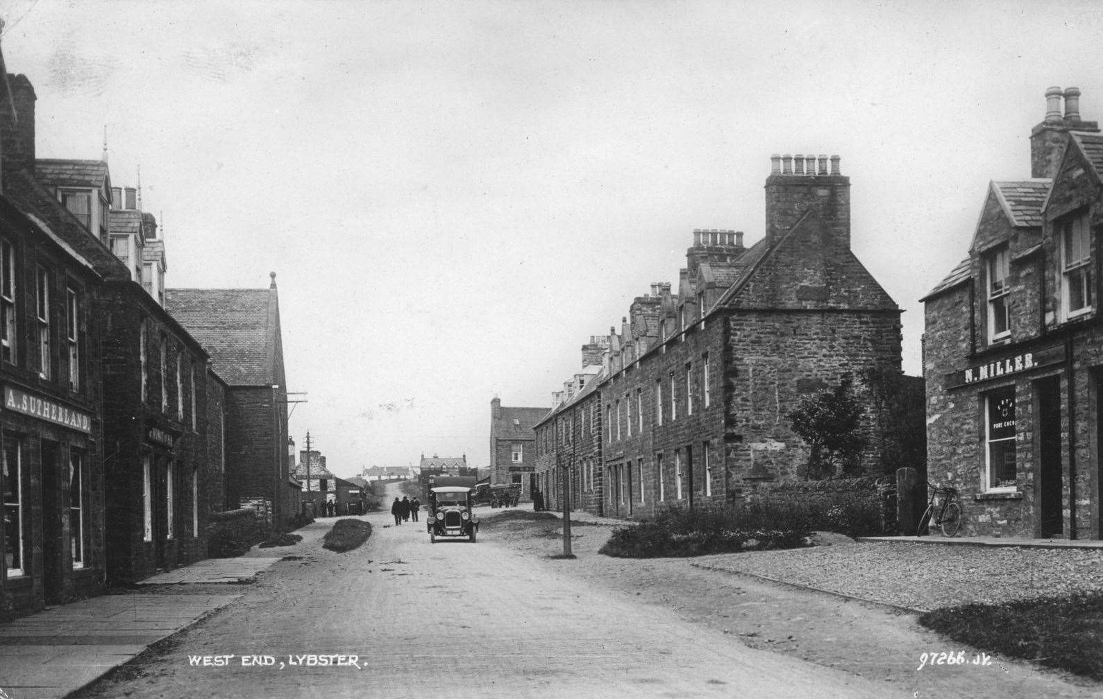 A postcard view of West End, Lybster, from around the 1930s, with a vintage car passing through (photographer not known). Henrietta Munro Collection