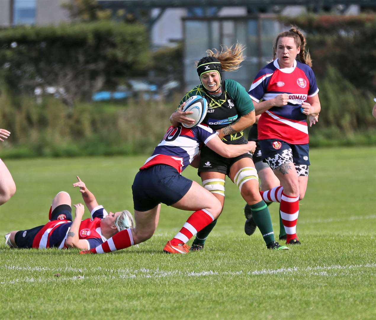Helen Richard is tackled during the recent 78-17 victory over Moray at Millbank. Picture: James Gunn