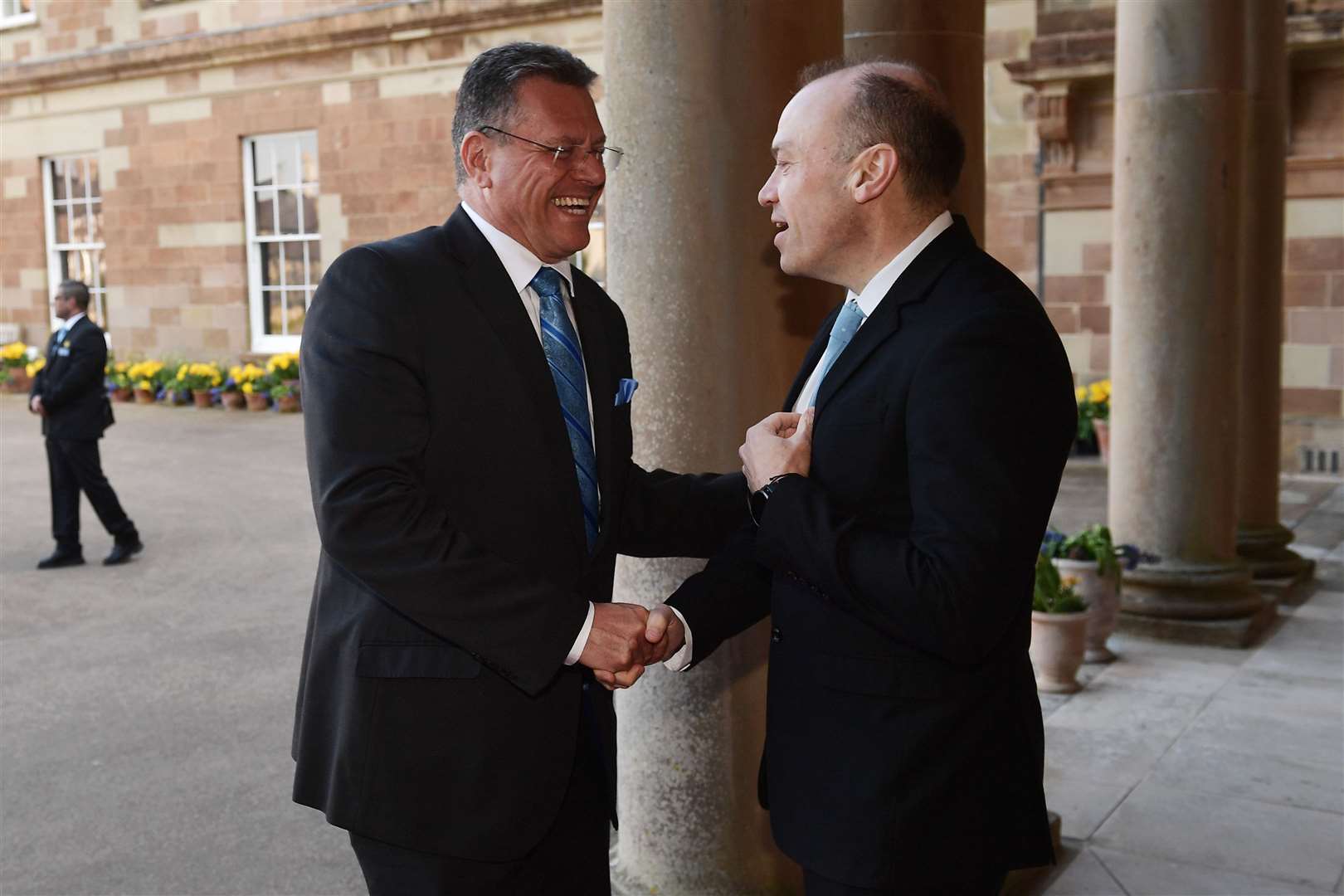 Maros Sefcovic, left, meets Northern Ireland Secretary Chris Heaton-Harris as they arrive for a dinner marking the 25th anniversary of the Good Friday Agreement (Charles McQuillan/PA)