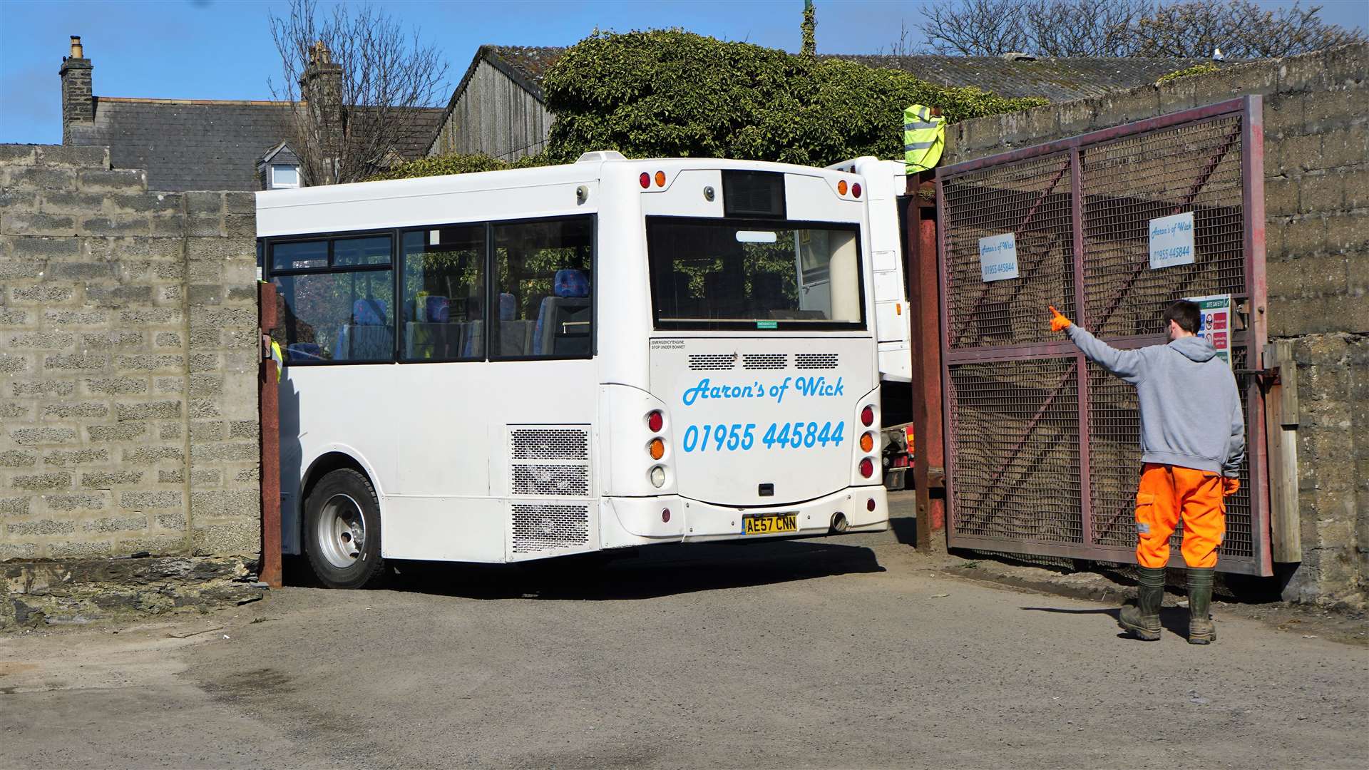 One of Aaron's buses arrives back in the Wick depot. He said he has paid thousands of pounds on repairs due to pothole damage on the route around Canisbay and Scarfskerry. Picture: DGS