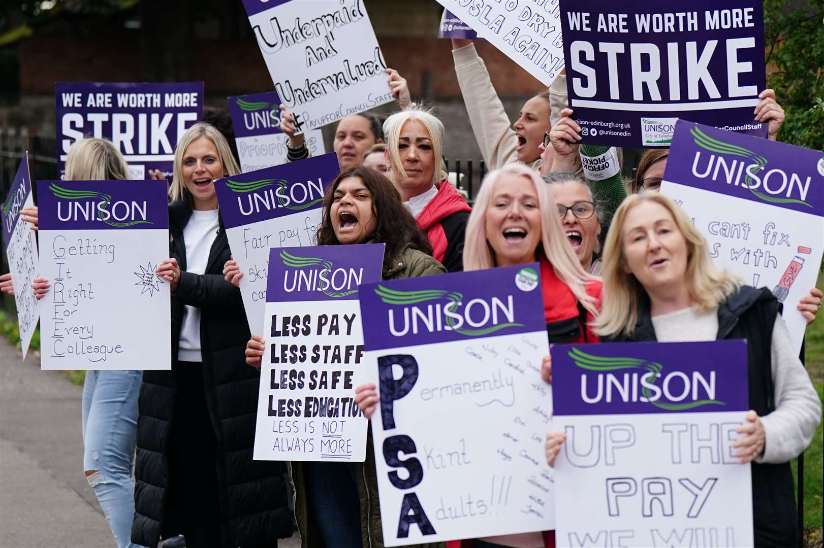 School support workers on the picket line at Trinity Primary School in Edinburgh earlier this week (PA)