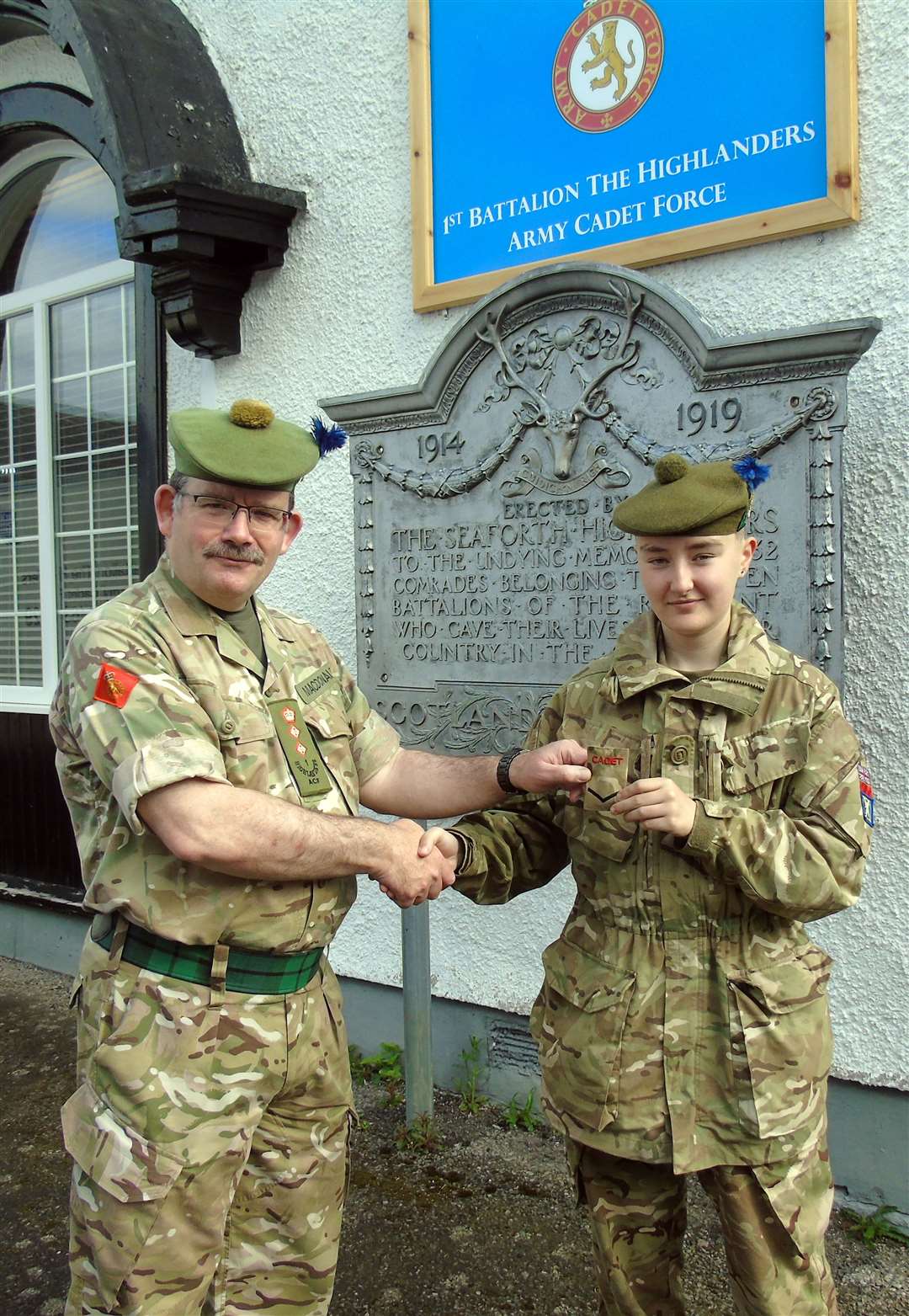 Cadet Texas Envain (right) from Wick being promoted to Lance Corporal by the Battalion's Commandant Colonel Mike MacDonald.