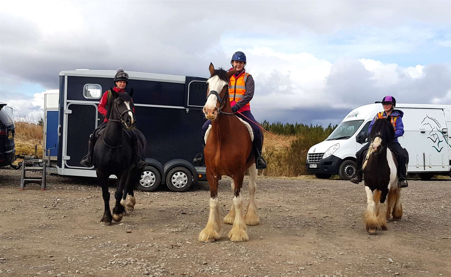 Cath Whittles and Dolly (right) prepare to set out on the Memory Ride along with Jane McDonough and Fudge (left) and Sharon Hepburn and her Clydesdale Hamish.