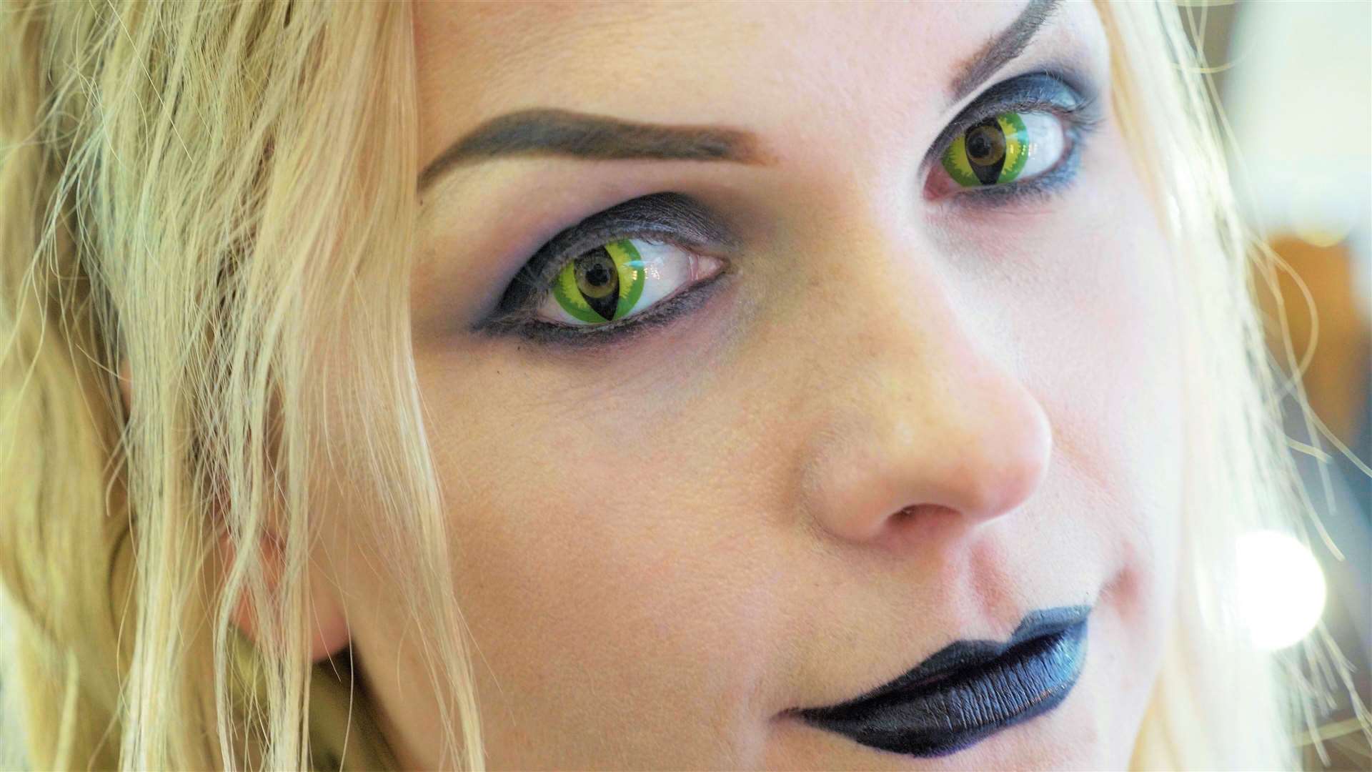 Cat eyes contact lenses have become popular with Halloween revellers.