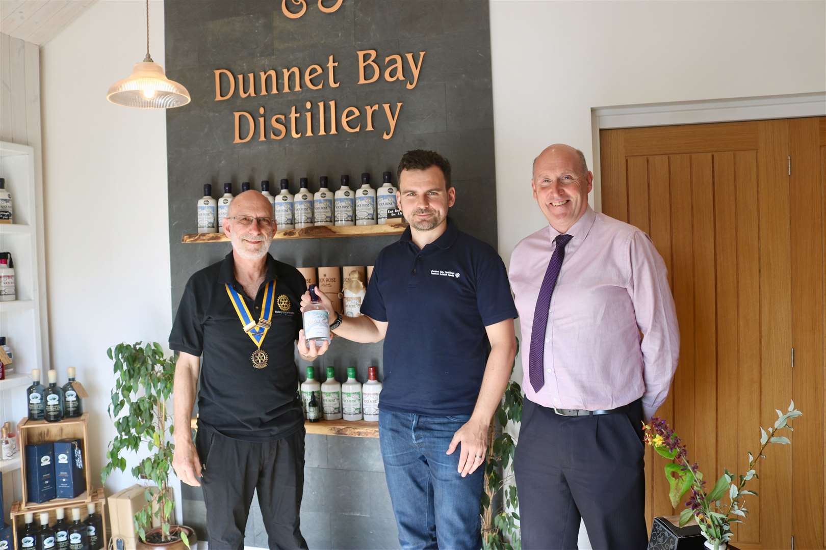 Displaying the first bottle of Cold Water Gin produced at the Dunnet distillery are (from left) Thurso Rotary Club president Alan Gerrard, Martin Murray, of Dunnet Bay Distillers, and Rotary treasurer Graeme Dunnett.
