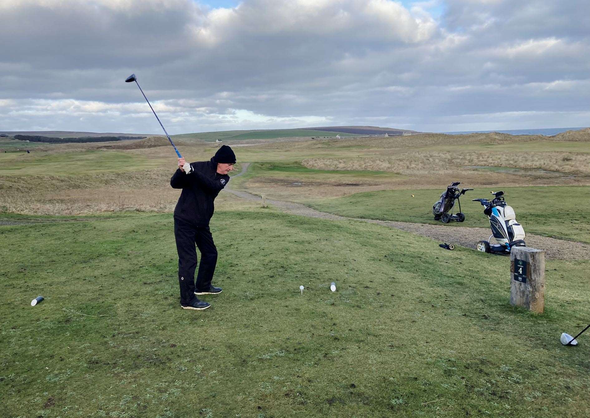 Fred Groves, winner of the latest round of the North Point Distillery Senior Stableford competition, teeing off at the fourth hole.