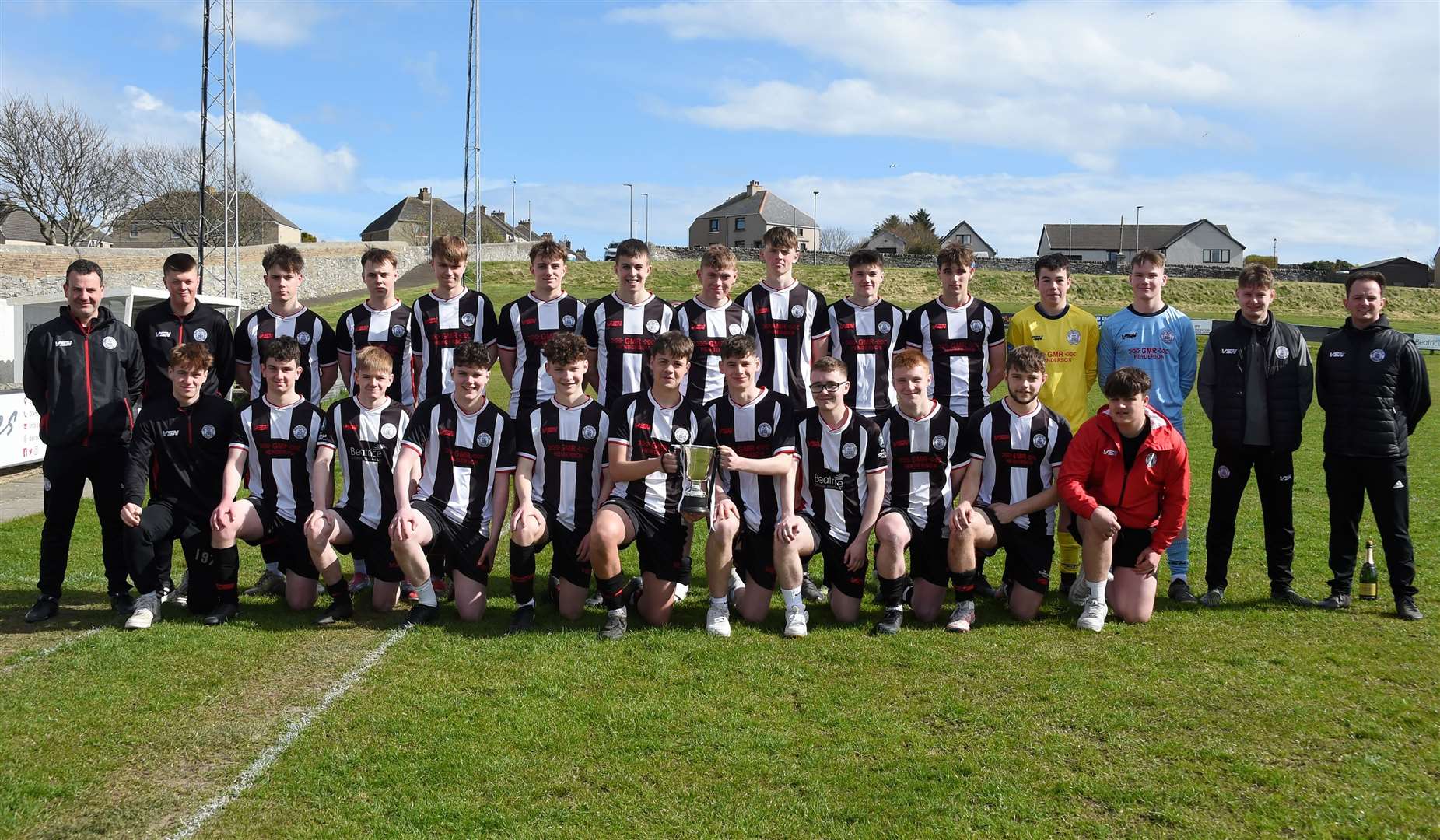 Wick Academy’s under-18s and their coaches with the SHFL Under 18 North trophy which they won earlier this month. Picture: Mel Roger