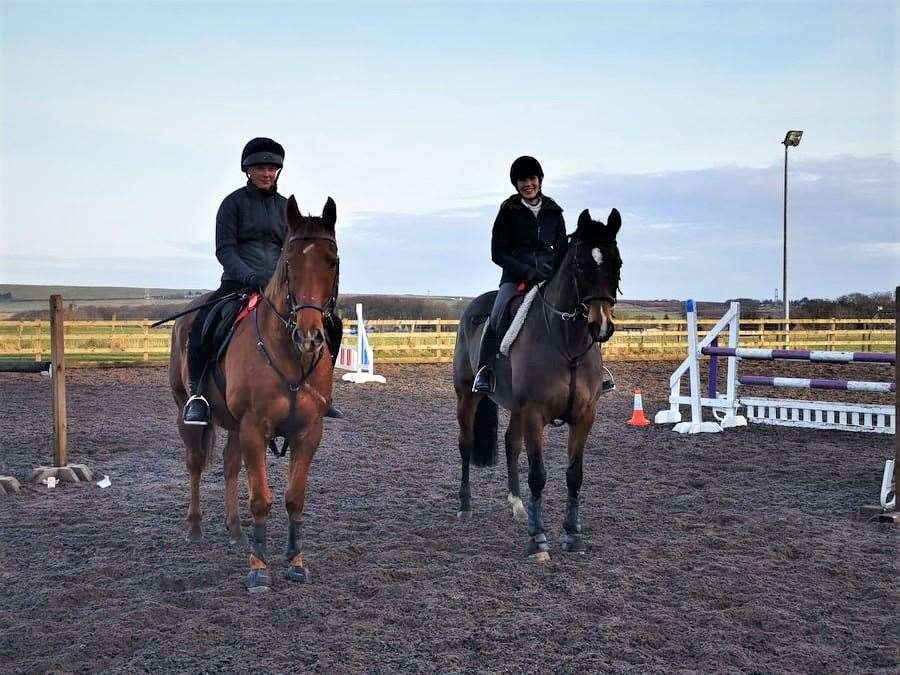 Mary Miller (right) on Poppy, winners of the 90cm top score competition, with Erin Hewitson and Rio, winners of the junior 95-100cm class.