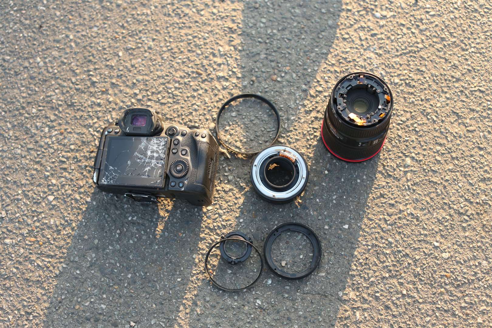 The damage caused to a camera after it was taken from a PA Media photographer outside court and thrown into a road, smashing it (James Manning/PA)