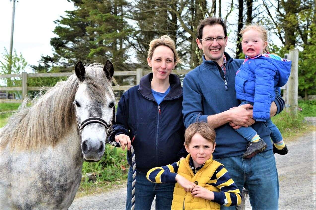 Vet Tom Southall at home with his wife Scye, son Magnus and daughter Daisy.