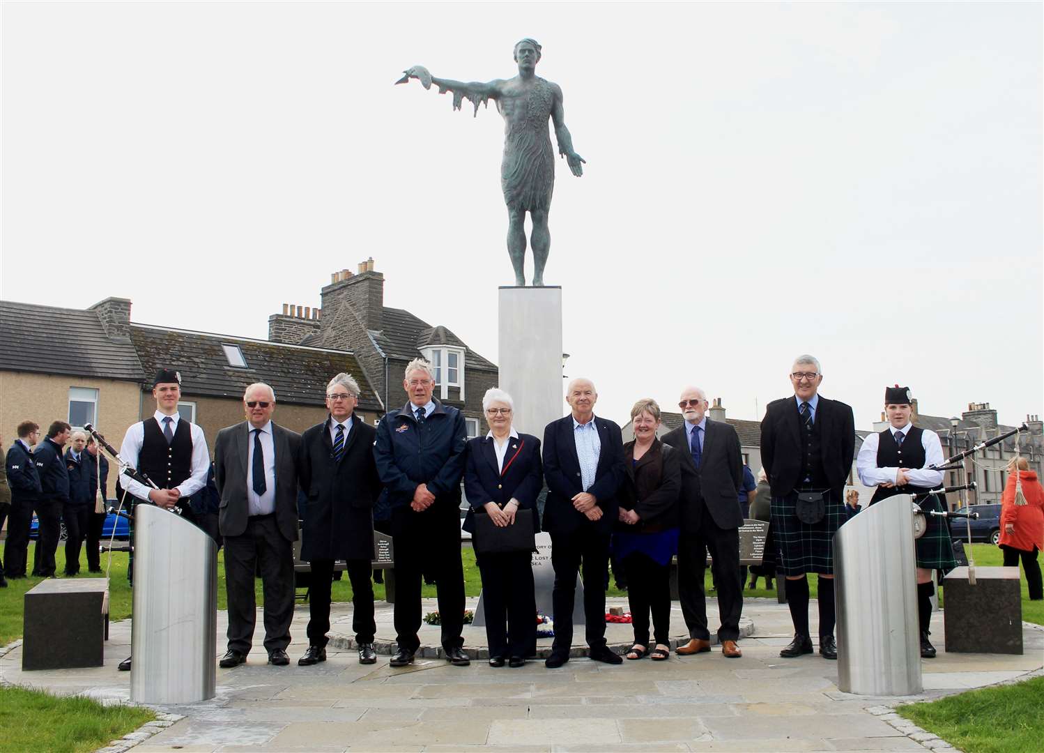 Some of those who took part in the National Fishing Remembrance Day ceremony at the Seafarers Memorial in Wick. Picture: Alan Hendry