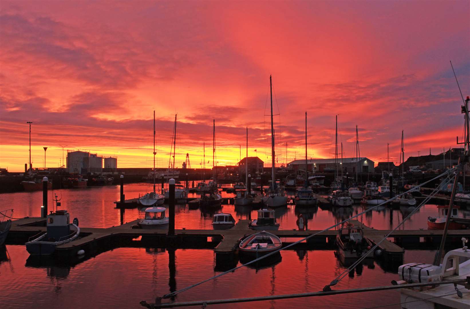 Red sky in the morning: sunrise over Wick Harbour on October 26. Picture: Alan Hendry