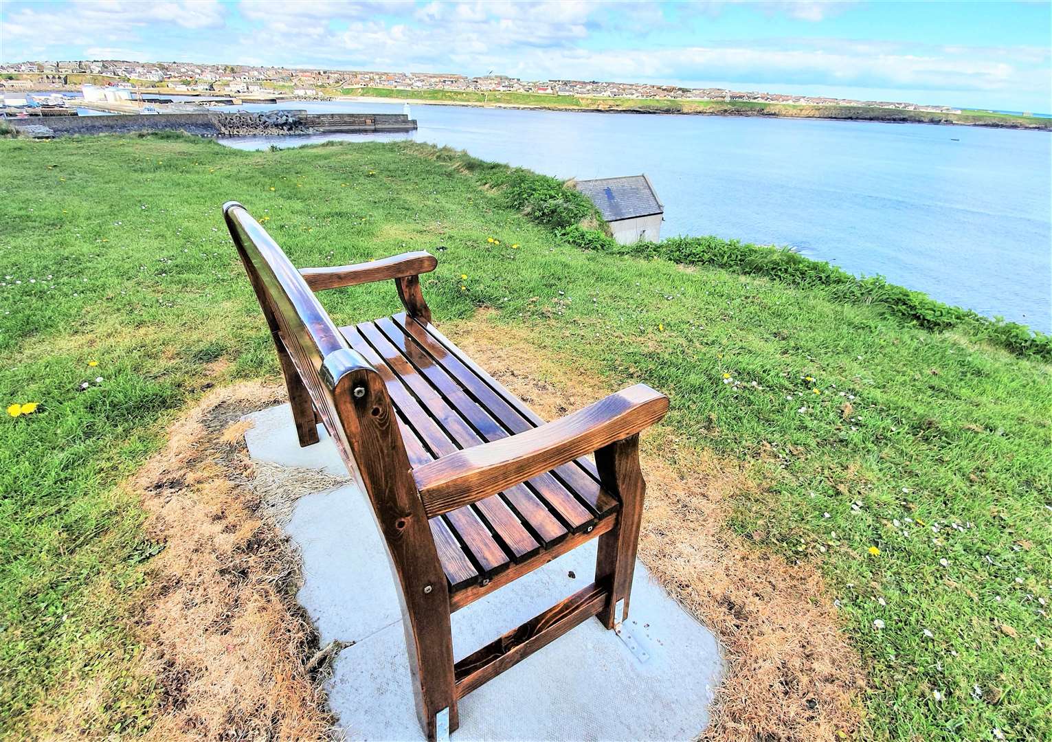 The view over scenic Wick Bay from the bench on the South Head.