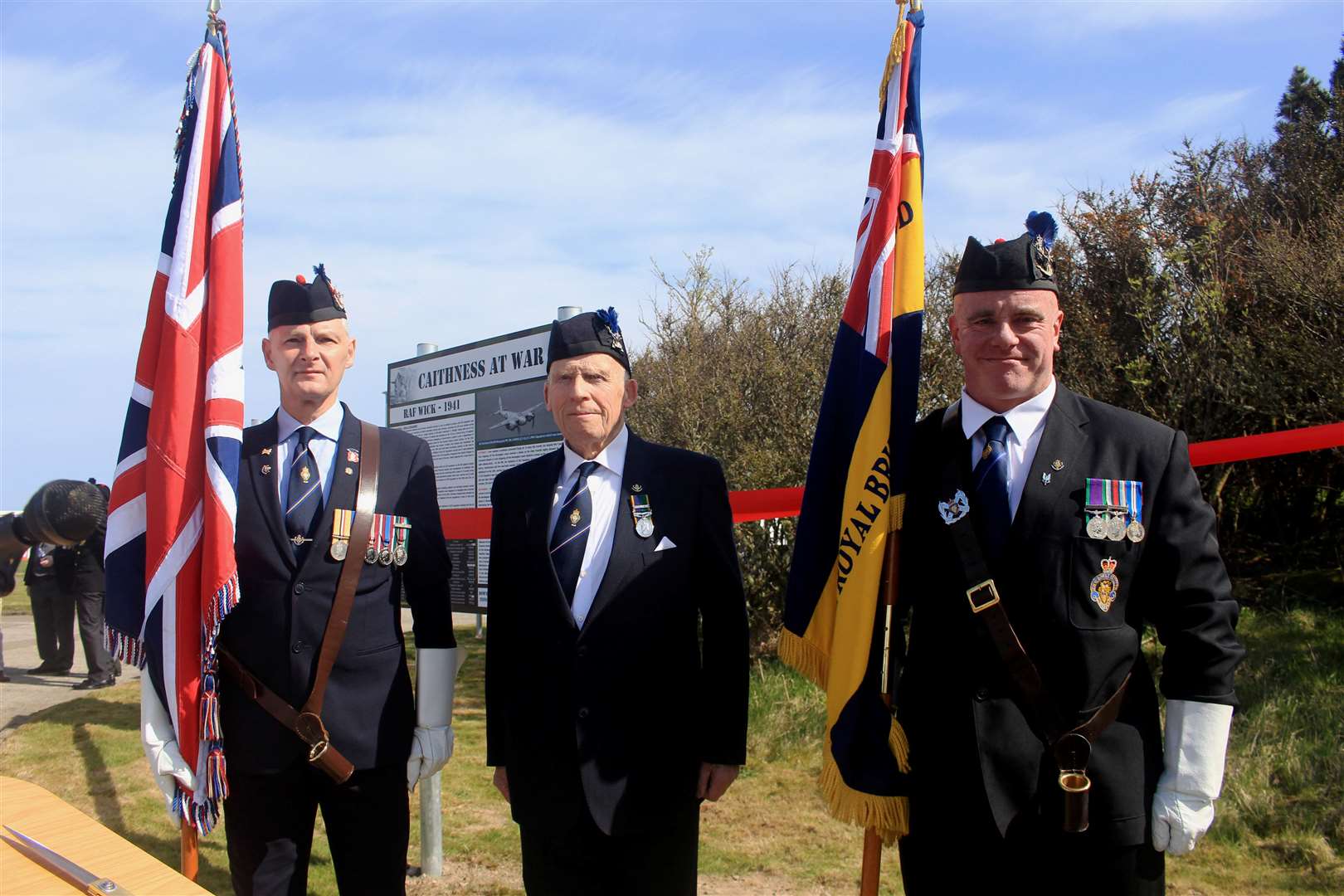Chairman Alex Paterson (centre) and standard-bearers Angus Mackay (left) and Kev Stewart from the Wick, Canisbay and Latheron branch of Royal British Legion Scotland. Picture: Alan Hendry