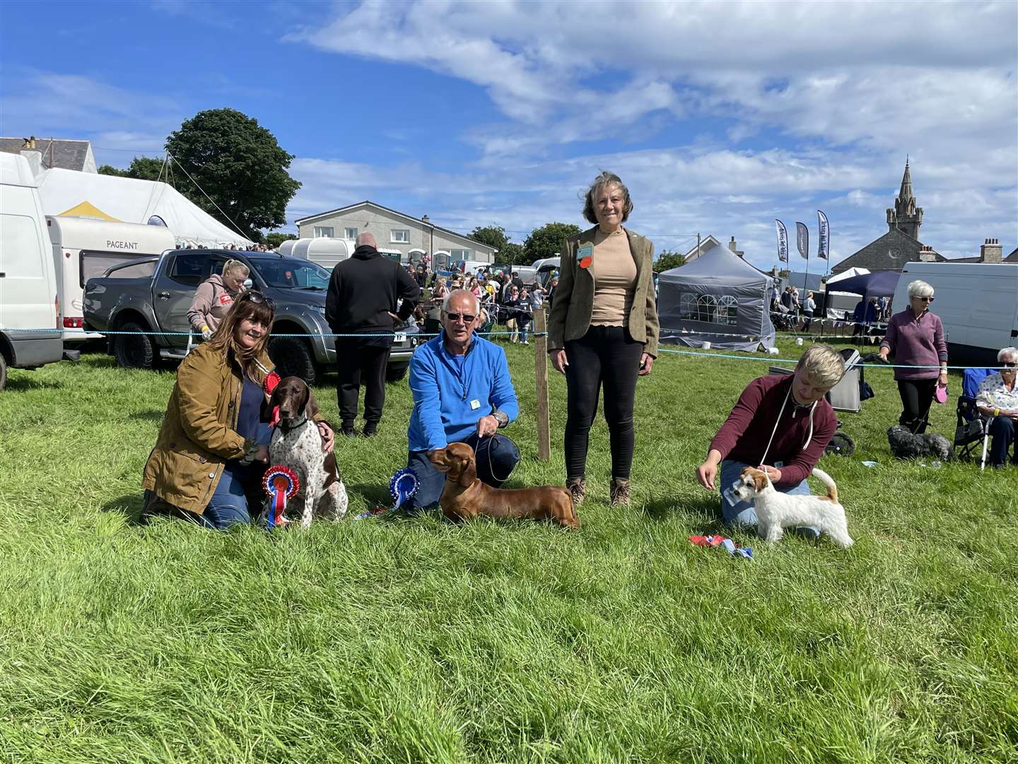 The winners in the Dog Show were from left: Christine Lord, Lochend (left) with her German Short Haired Pointer who was awarded Best in Show title, Ian Swanson, Wick with his Dachshund took the reserve prize while Sam Mackay, Castletown, won the Best Puppy in Show with his Jack Russell Terrier. Judge Catherine Woodsford, Lairg, is standing with the winners.